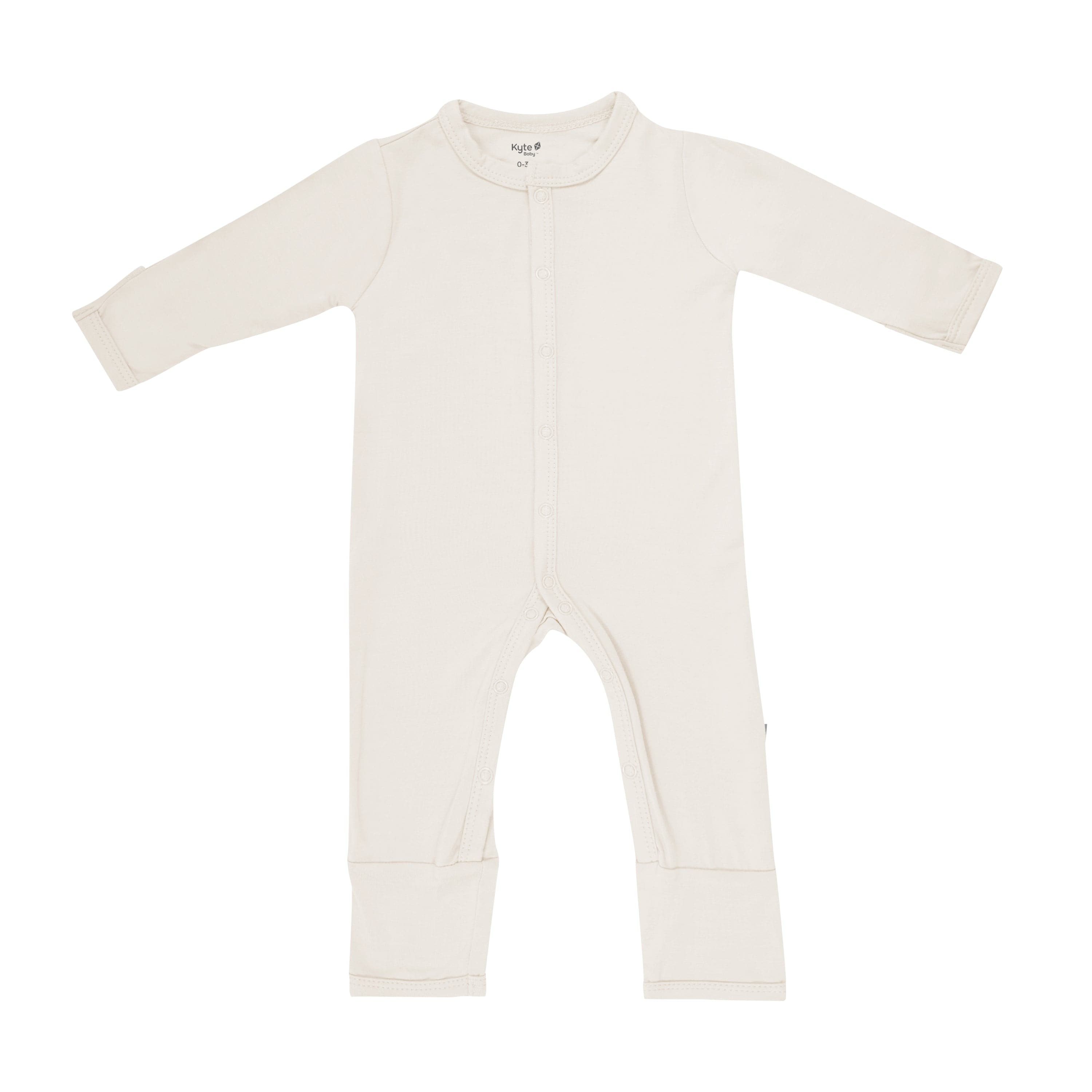 Flat lay on Kyte Baby Romper in Oat