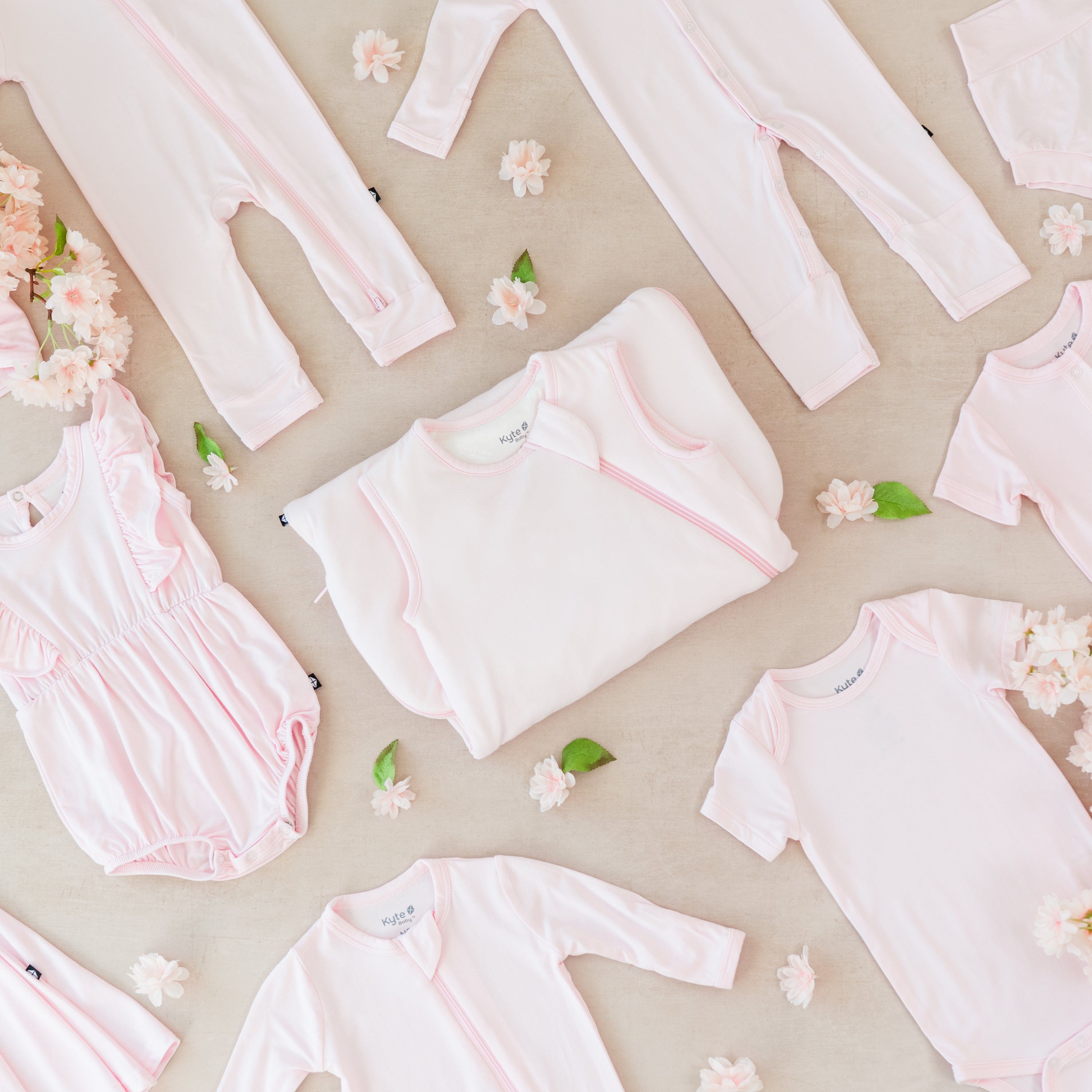 Kyte Baby bamboo clothing and sleep bags in Sakura pink