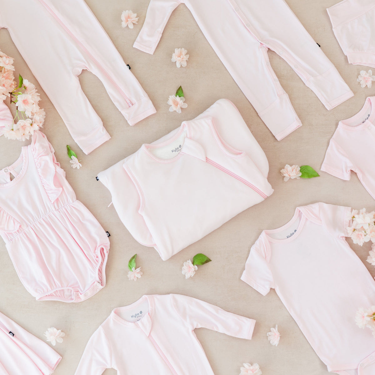 Kyte Baby bamboo clothing and sleep bags in Sakura pink