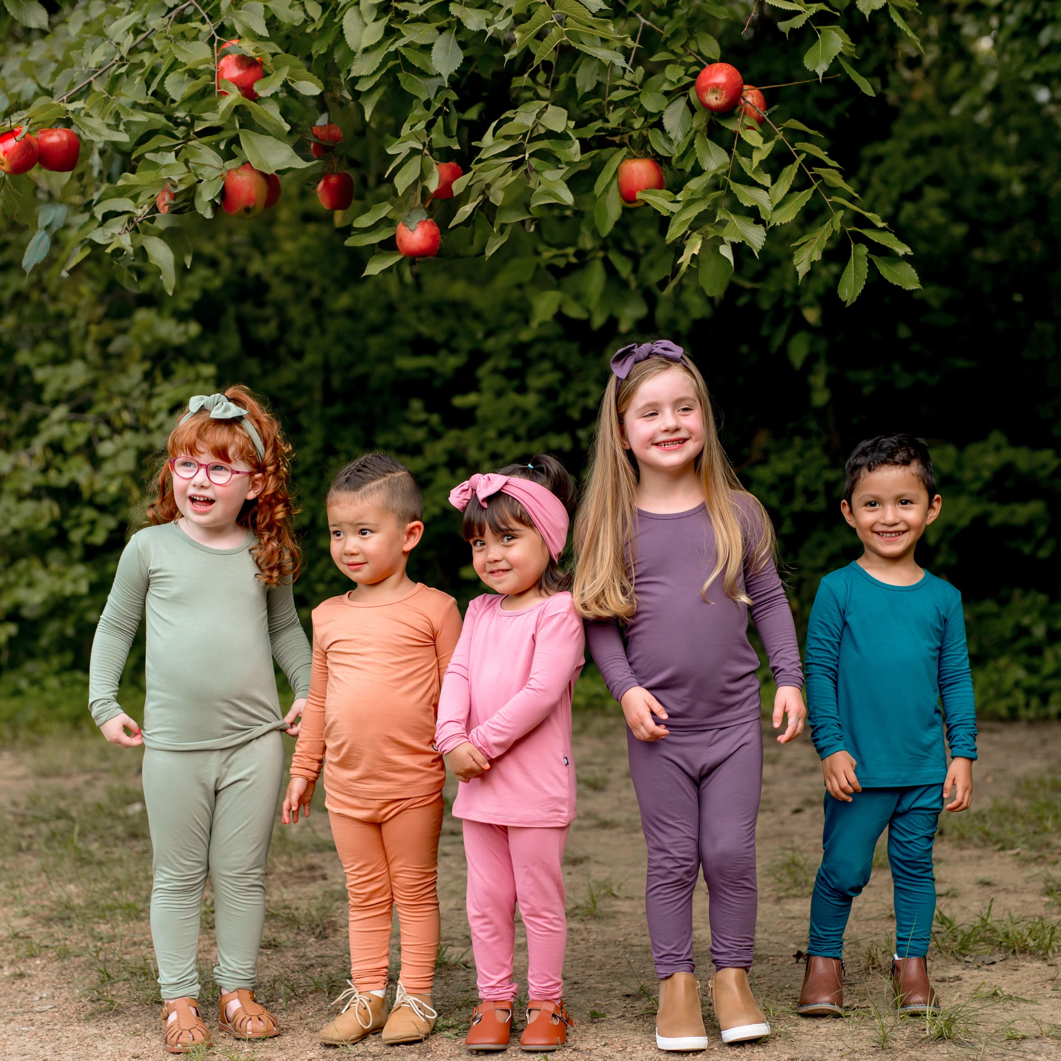 Kids wearing Long Sleeve Toddler Pajamas in core colors