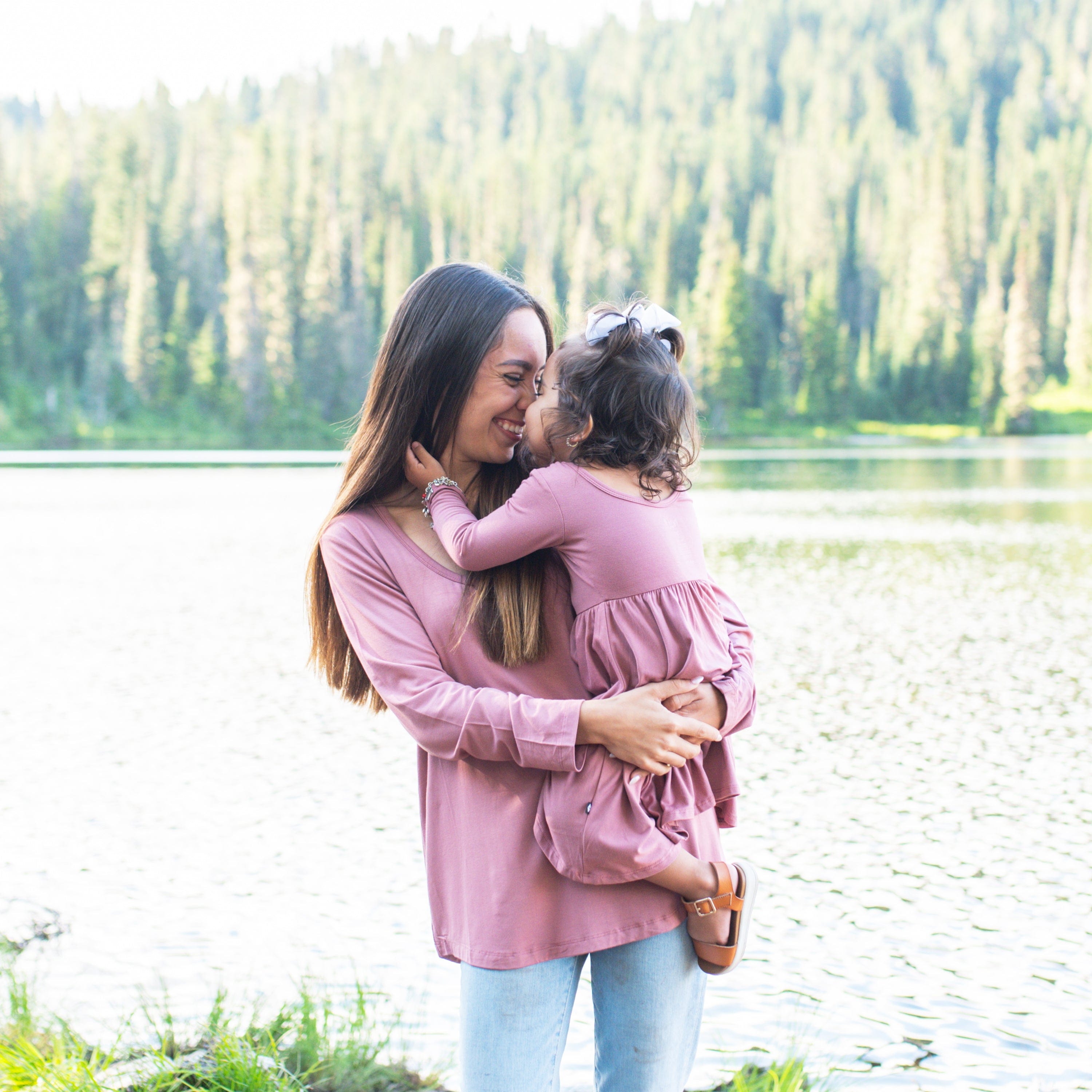 Mom and daughter wearing Kyte Baby matching family outfits in Dusty Rose