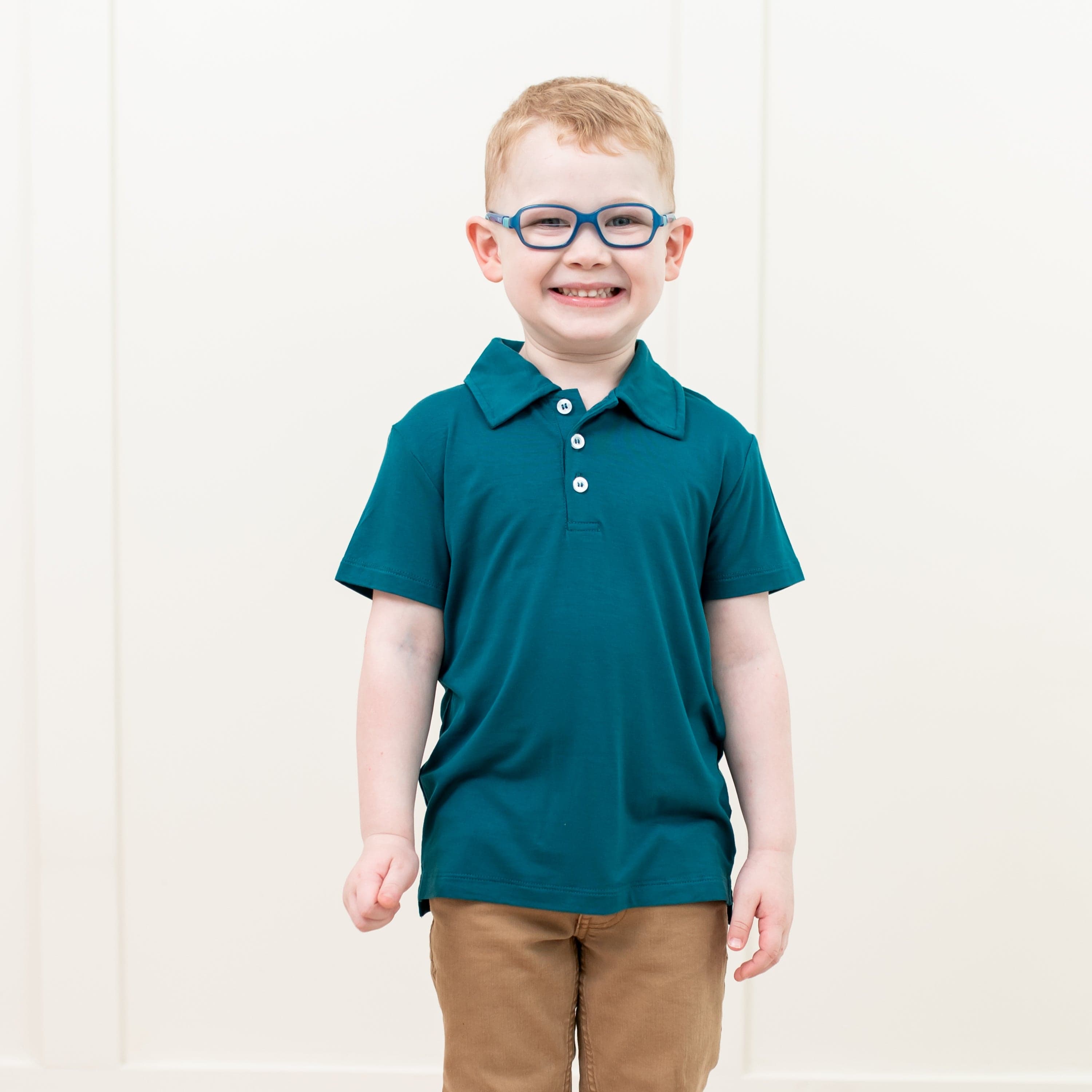 Toddler wearing Kyte Baby Short Sleeve Polo in Loch