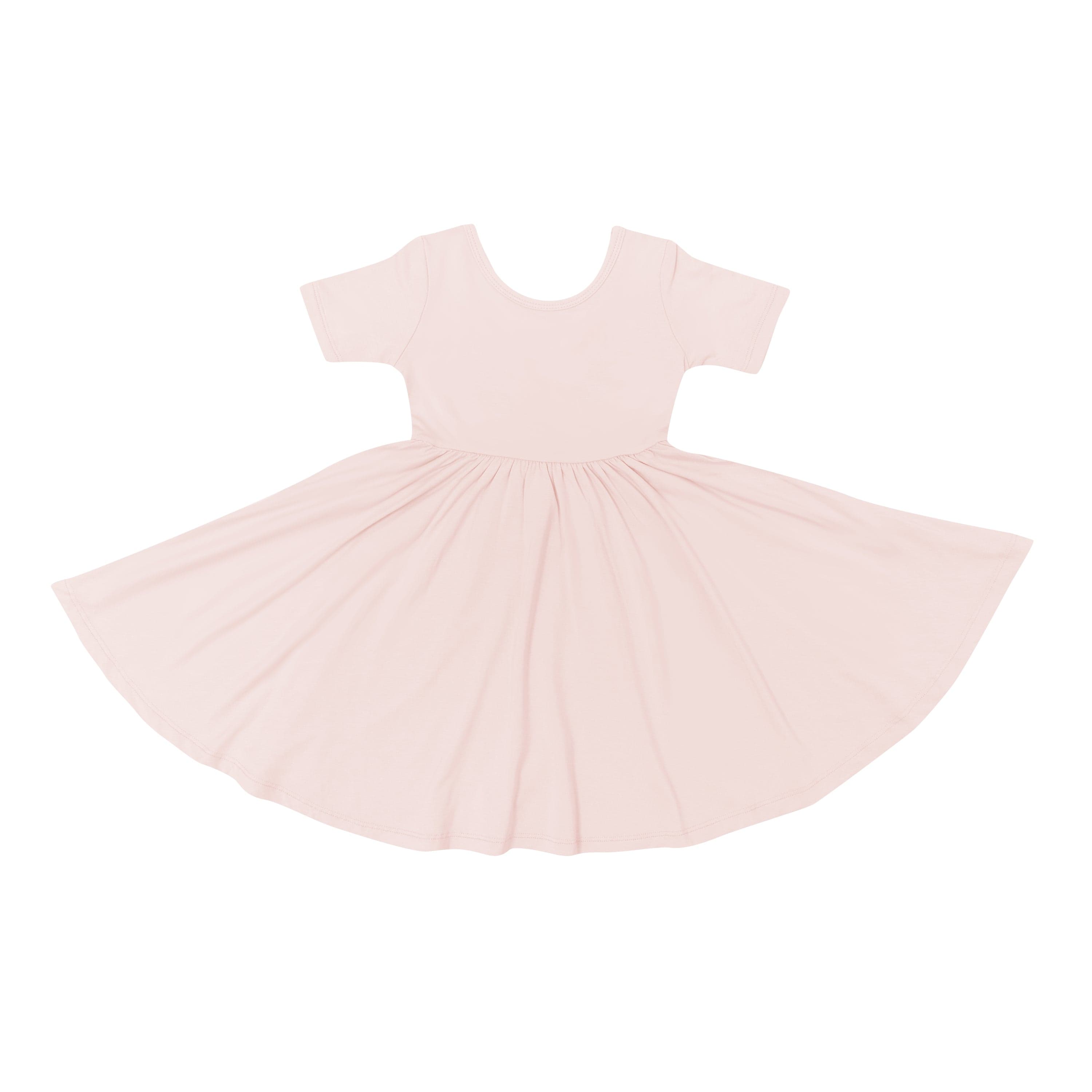Flat lay of Kyte Baby Toddler Twirl Dress in Blush