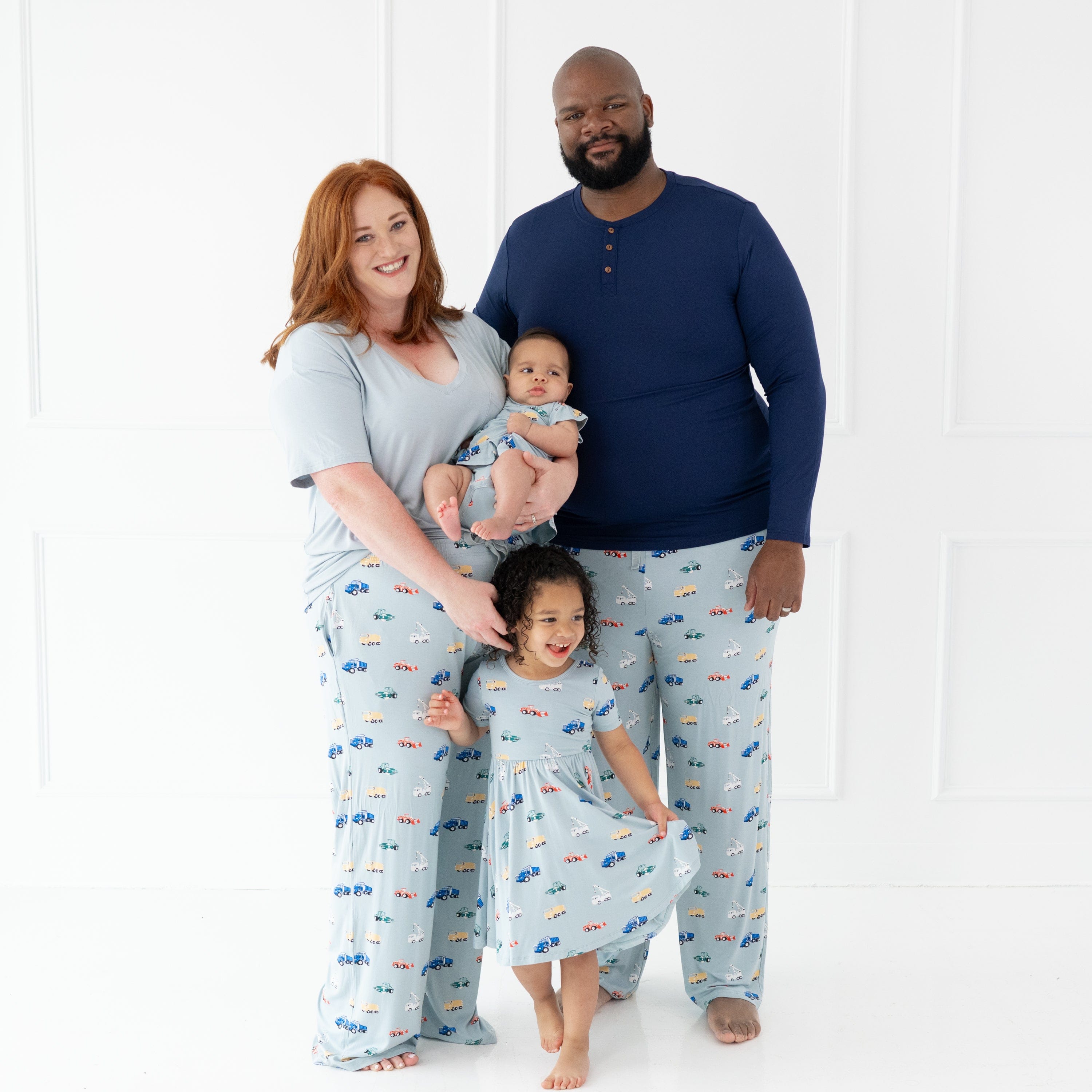 Family of four all matching in various items from the Construction collection