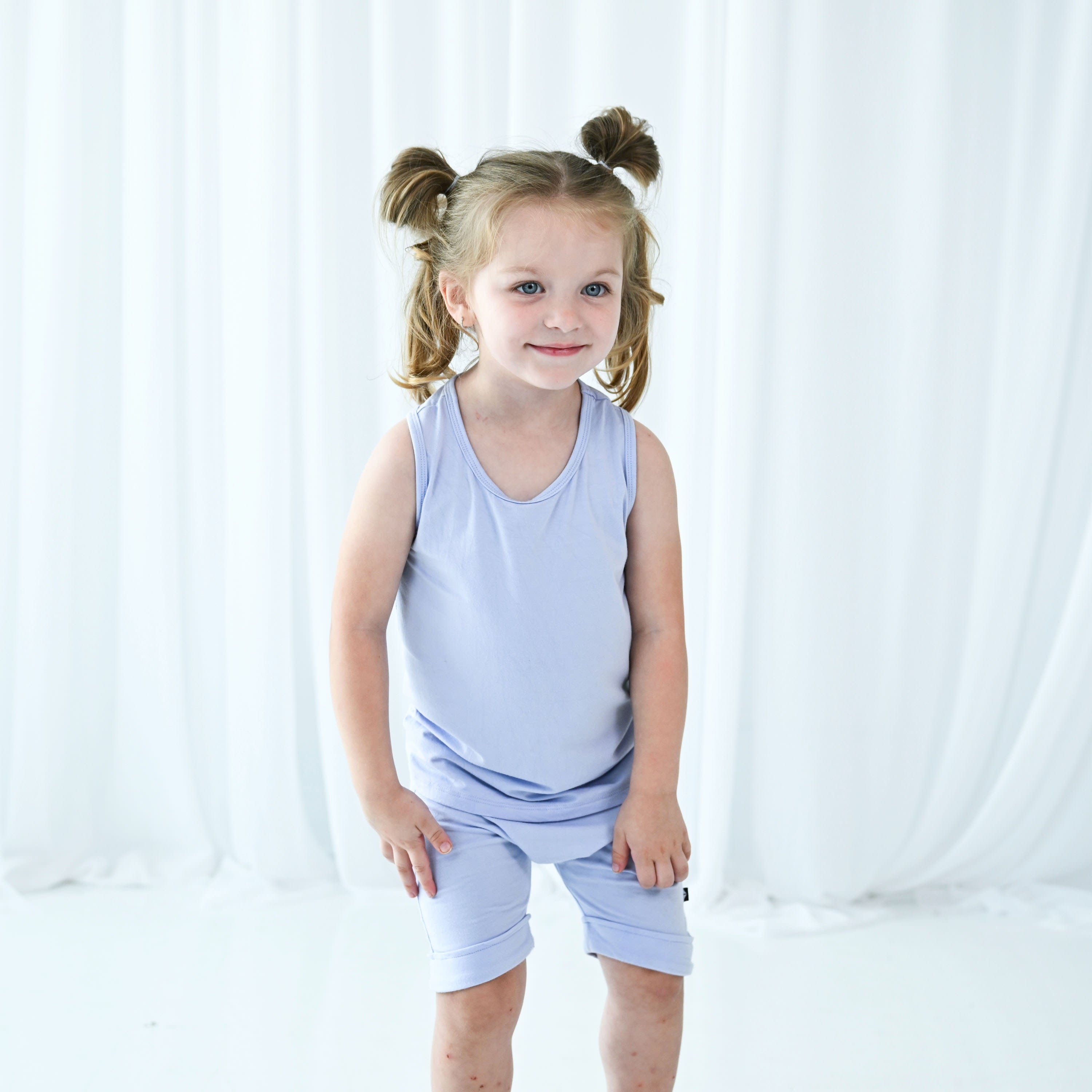 Toddler wearing Kyte Baby bamboo Tank Top in Lilac purple