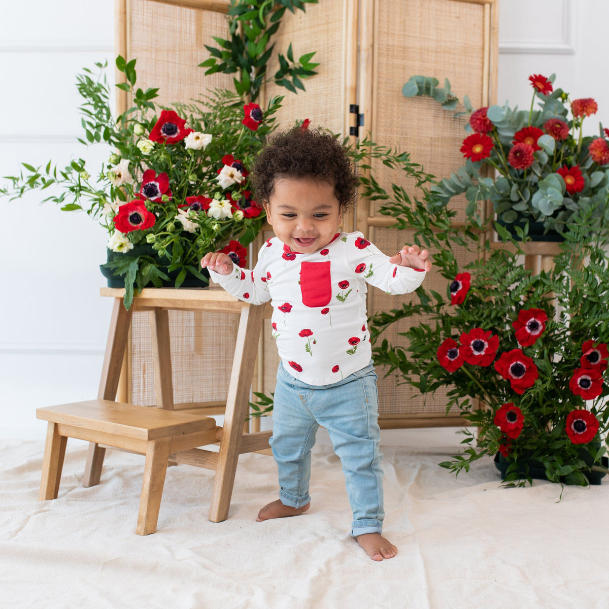 Toddler wearing Kyte Baby Long Sleeve Crew Neck Tee in Cloud Poppies