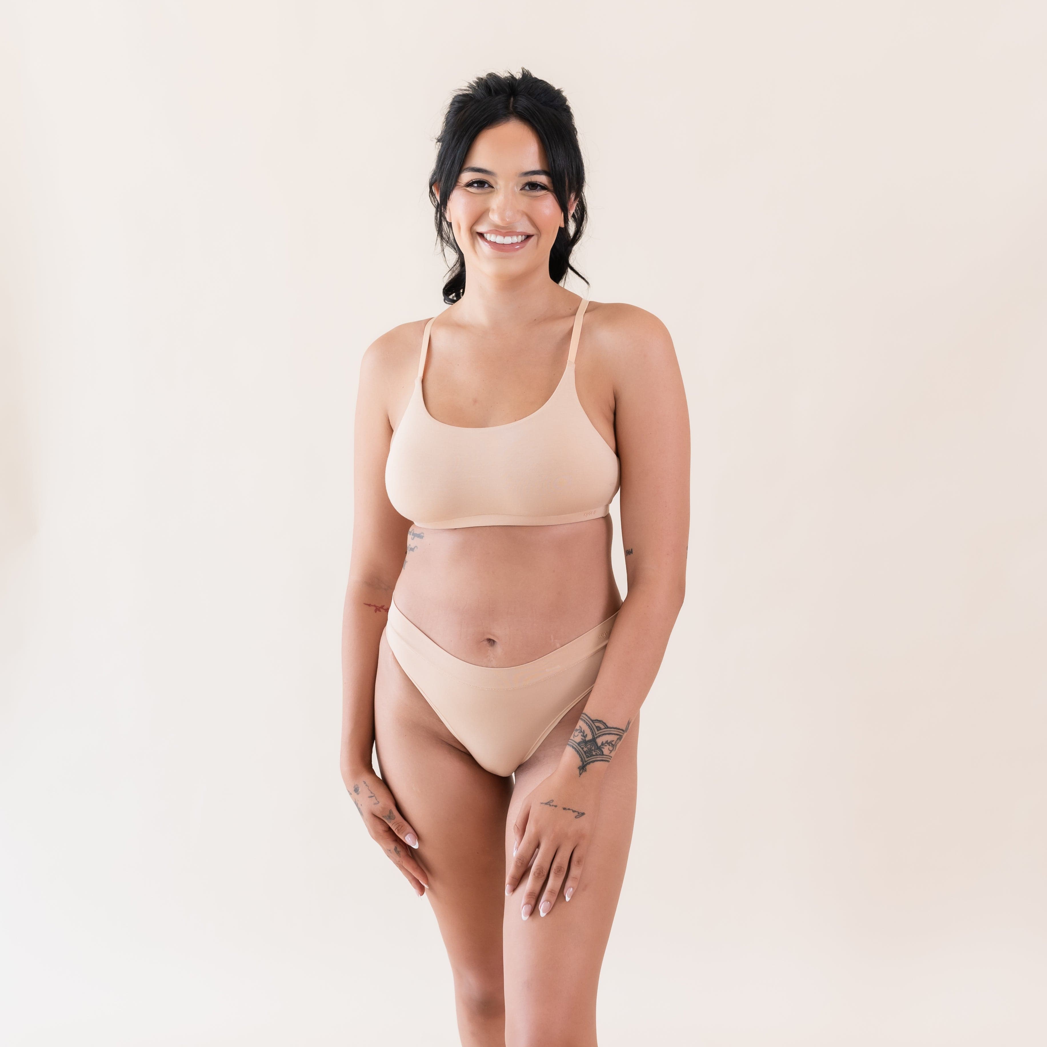 Woman wearing Kyte Baby Women's Cheekini in Chai