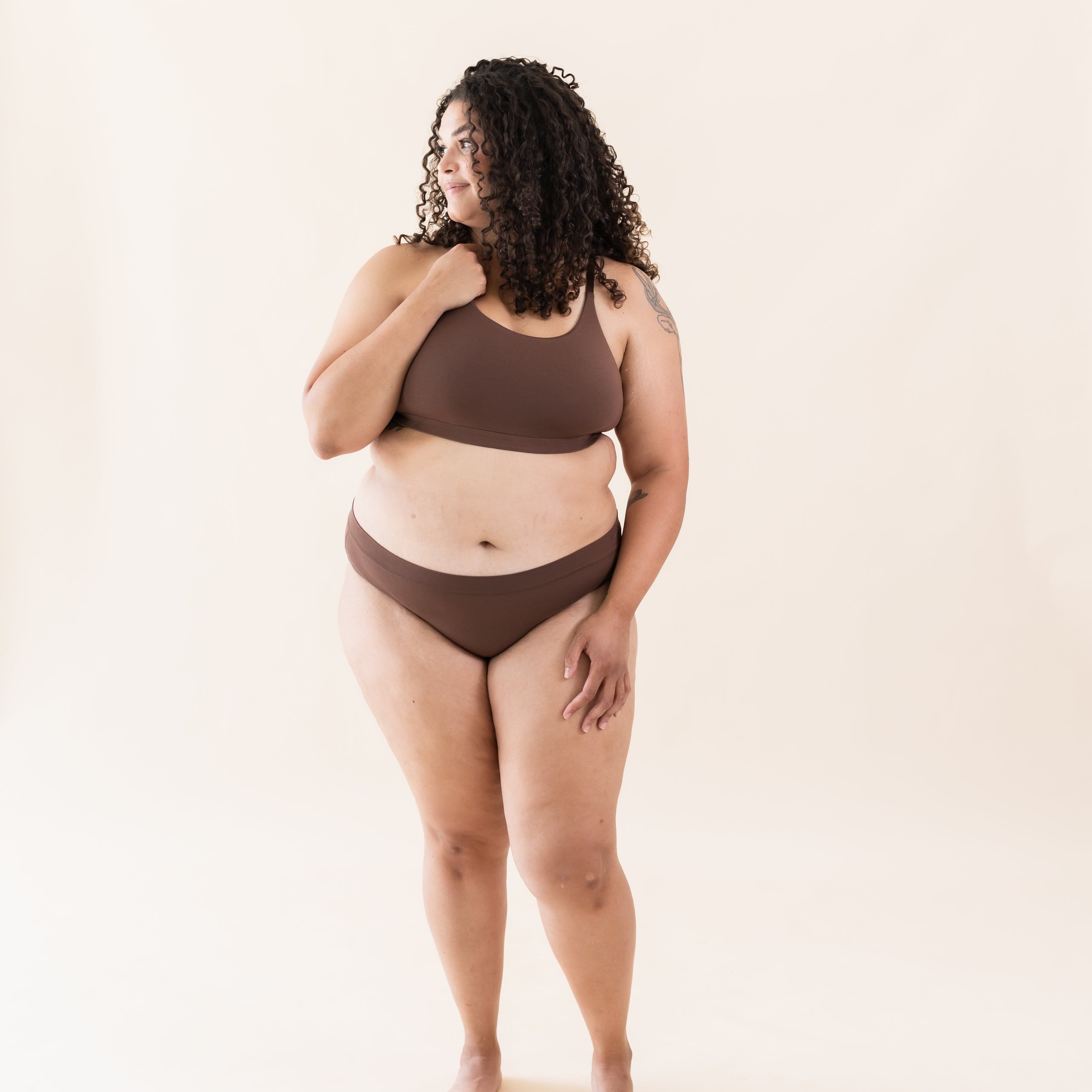 Woman wearing Kyte Baby Women's Cheekini in Toffee