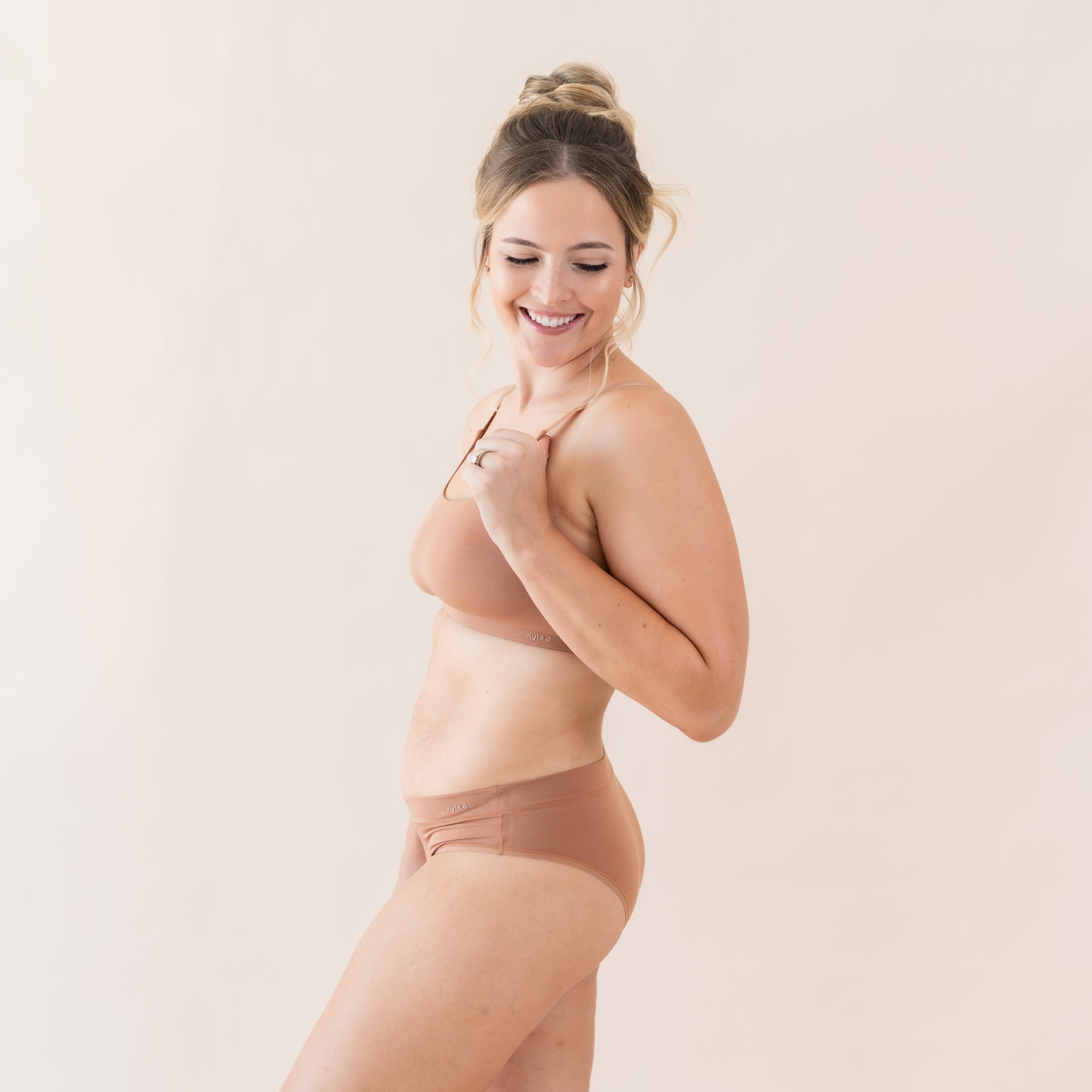Woman wearing Kyte Baby Women's Cheekini Underwear in Latte