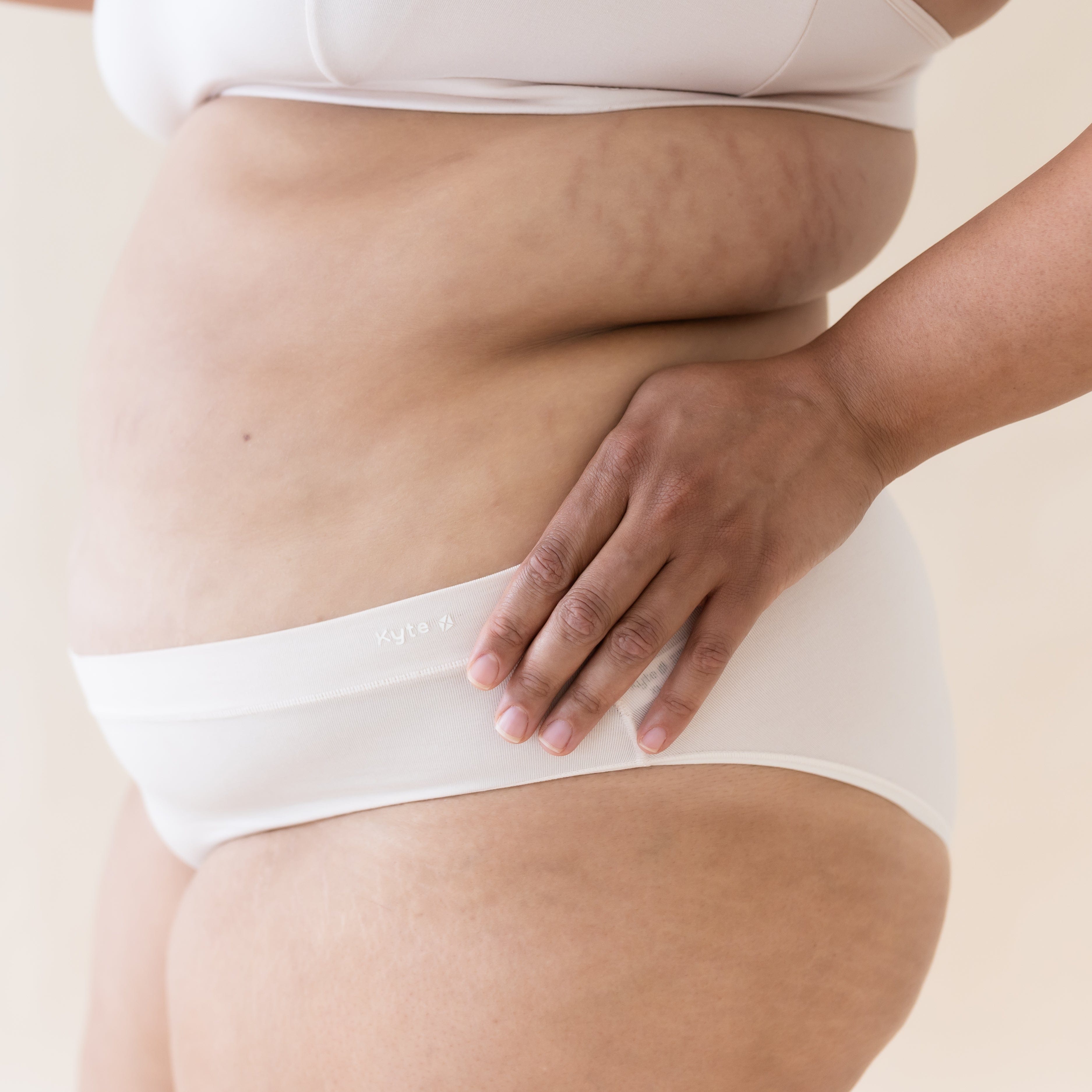 Woman wearing Kyte Baby Women's Cheekini Underwear in Blonde