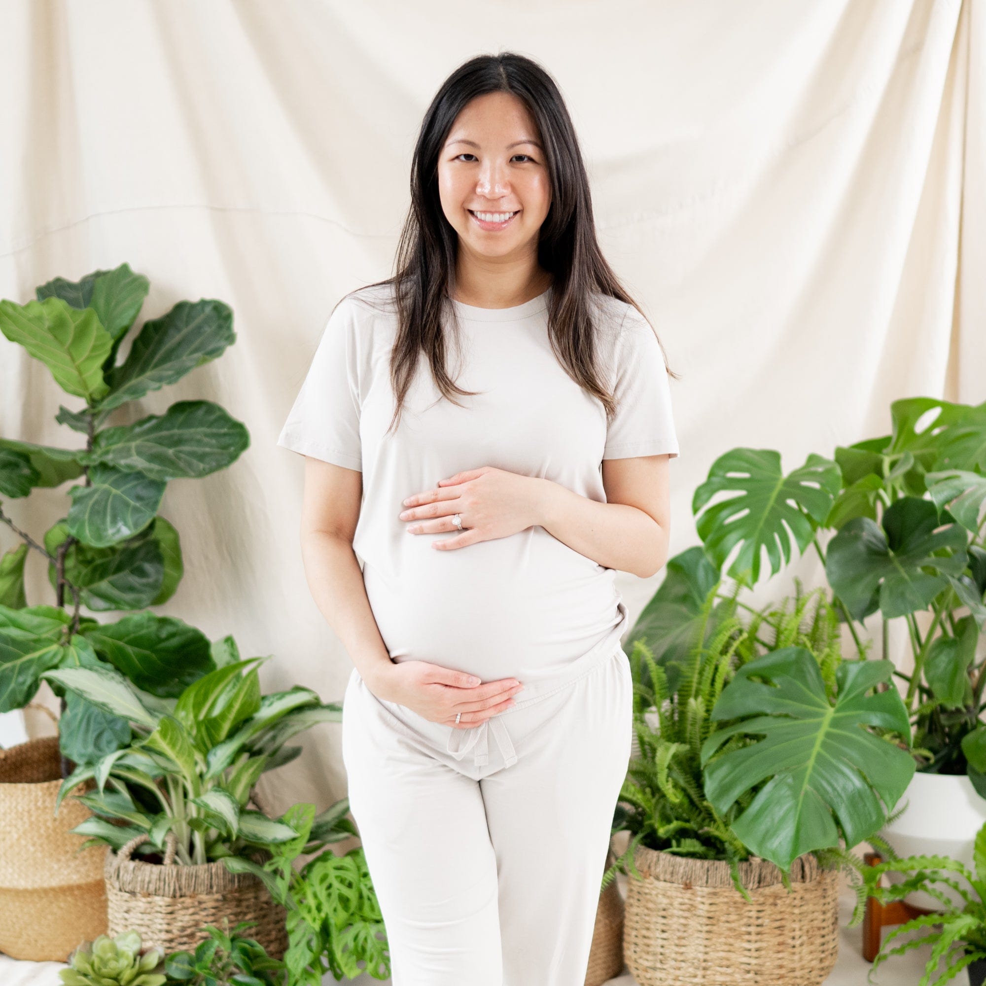 Woman wearing Kyte Baby Women's Crew Neck Tee in Oat