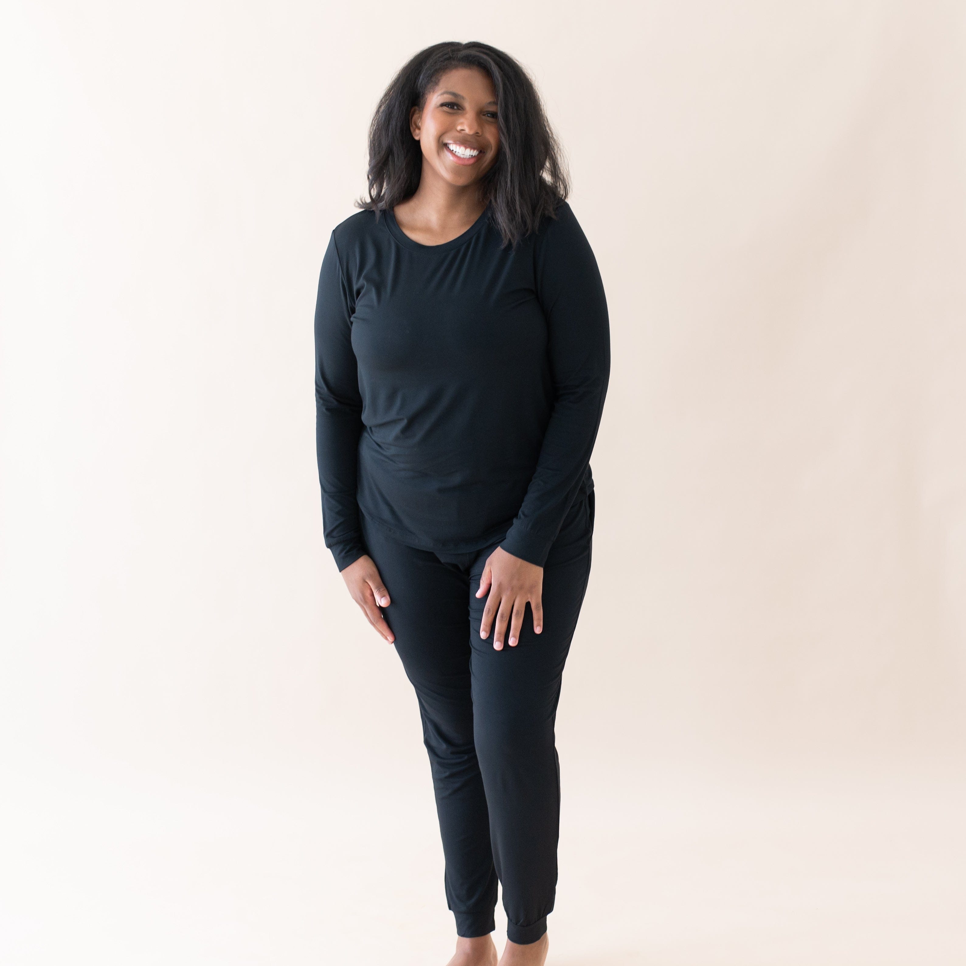 Model wearing Women's Jogger Black Pajamas