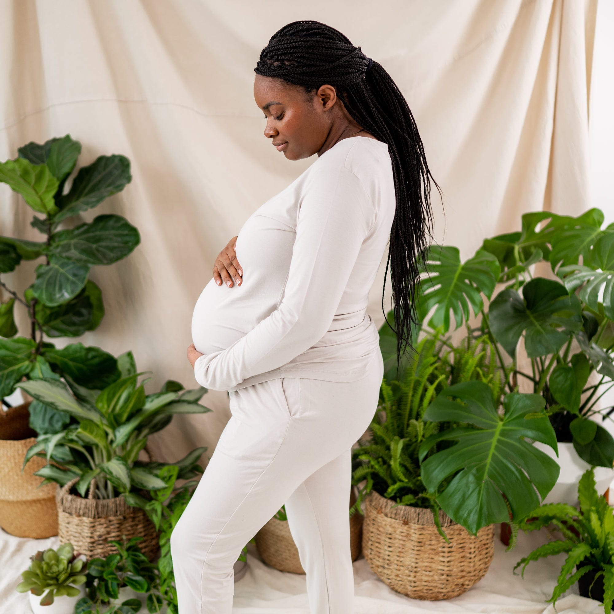 Woman wearing Women's jogger pregnancy pajama set in Oat