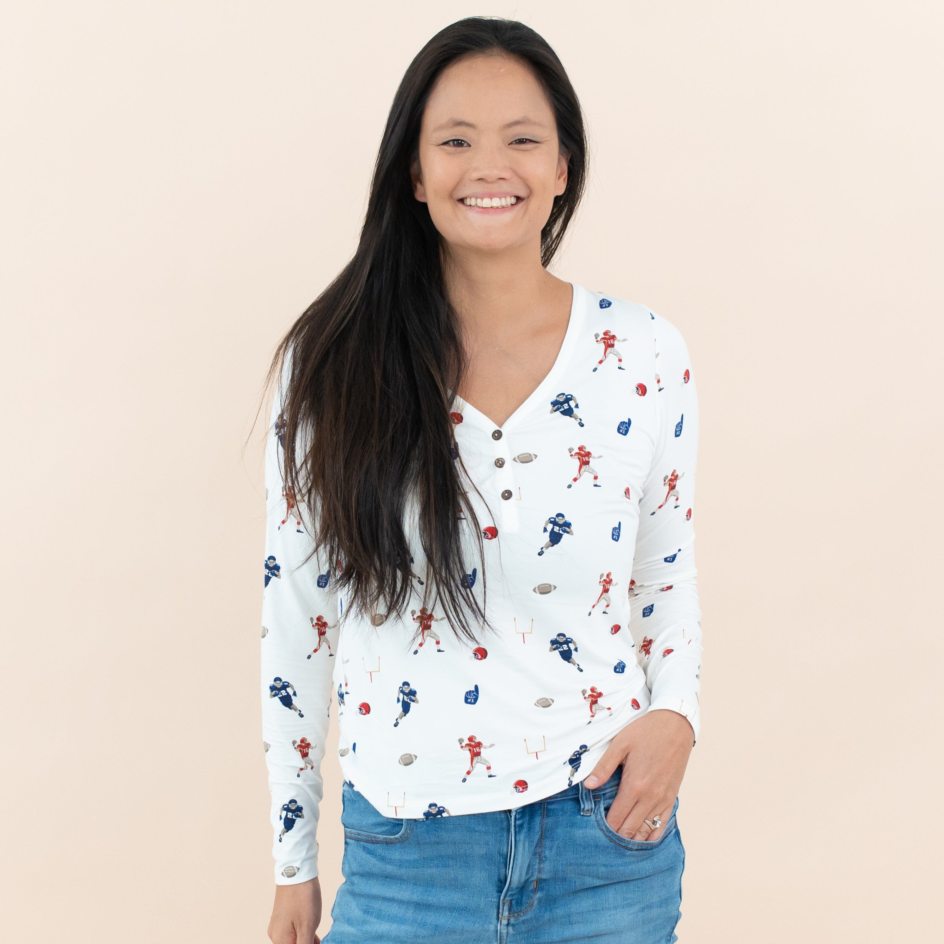 Woman wearing Kyte Baby Women's Bamboo Long Sleeve Henley Tee in Football