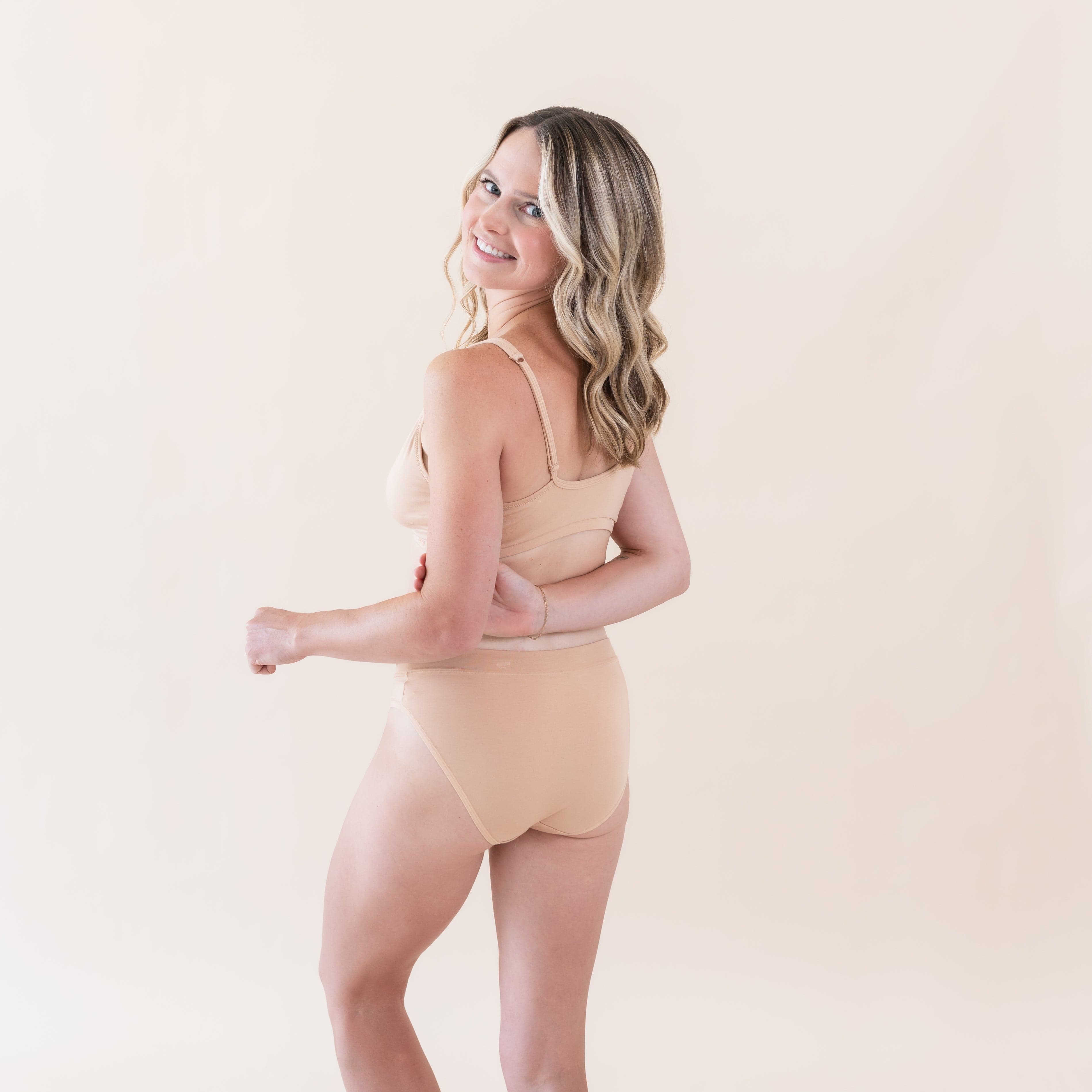 Woman wearing Kyte Baby Women's Midi Brief in Chai
