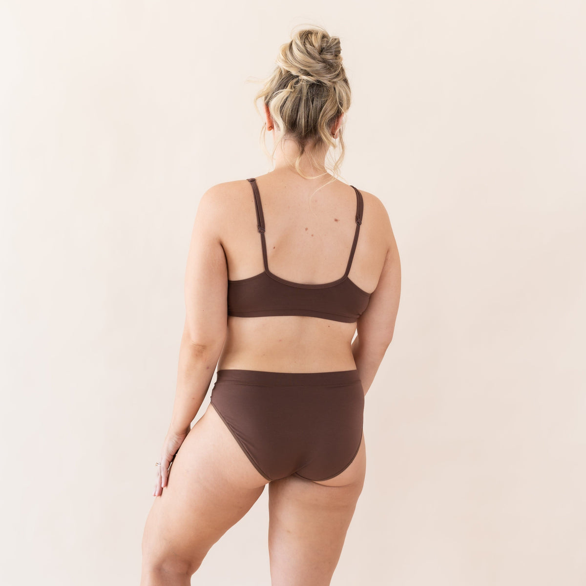 Woman wearing Kyte Baby Women's Midi Brief Underwear in Toffee