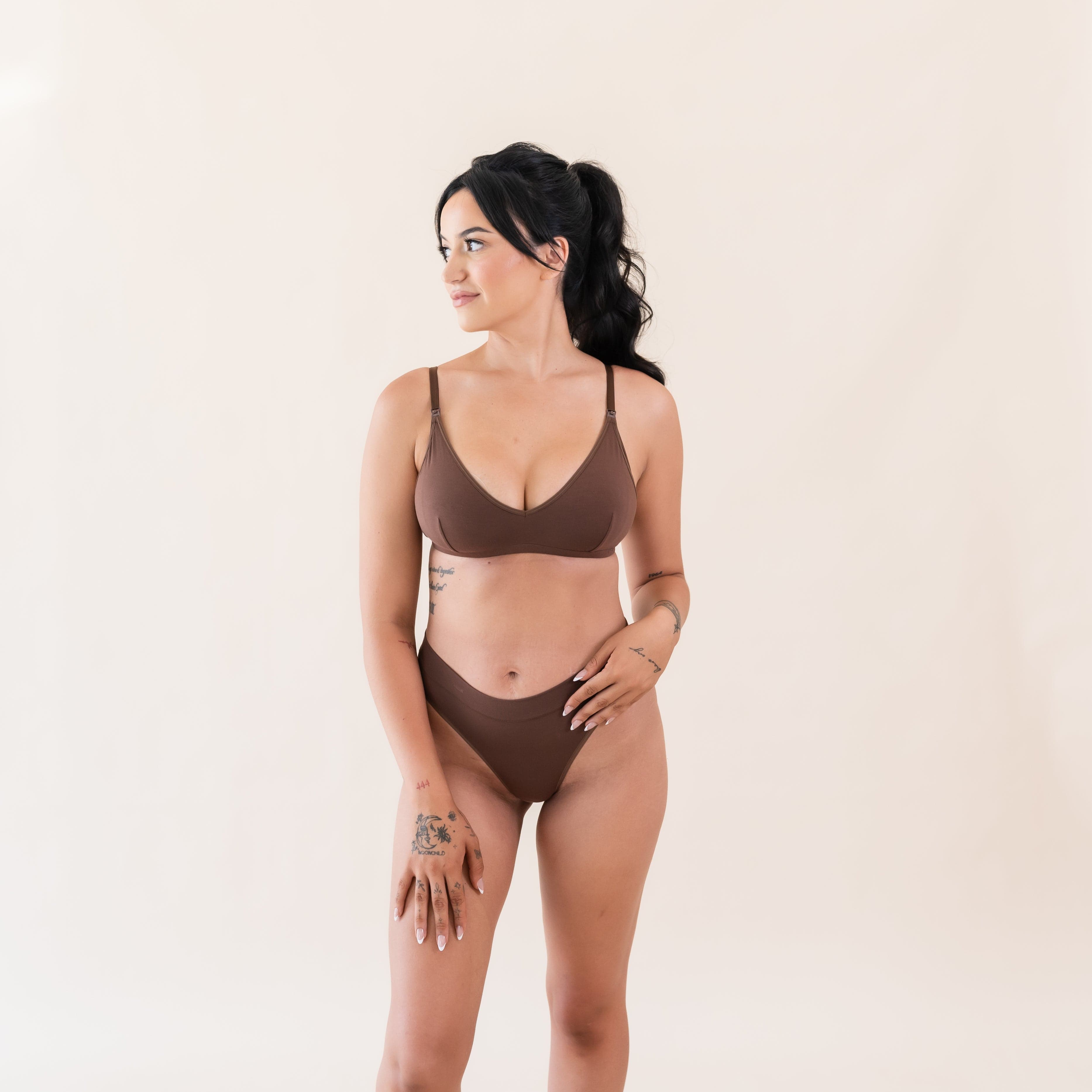 Woman wearing Kyte Baby Women's Nursing Bra in Toffee