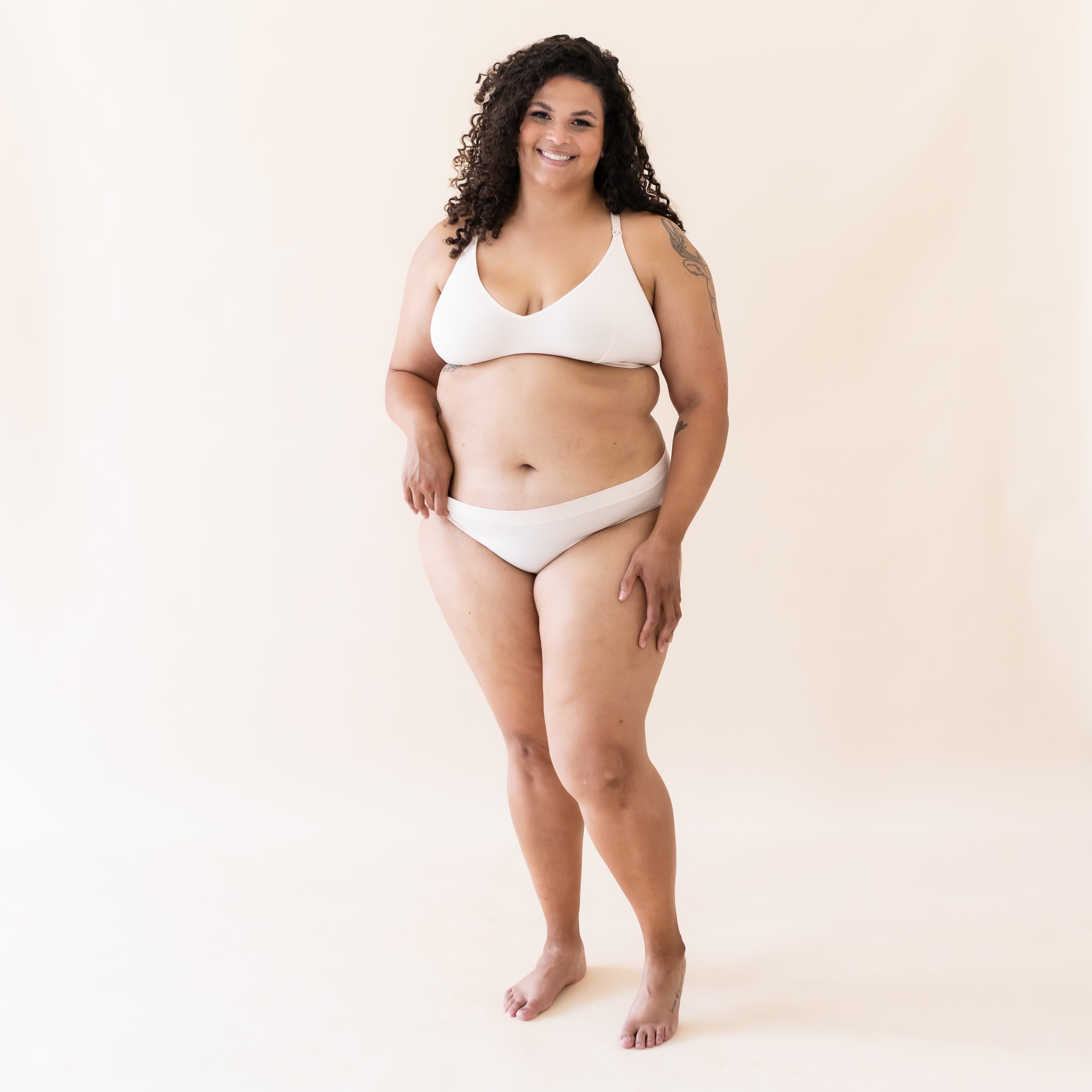 Woman wearing Kyte Baby Women's Nursing Bra in Blonde