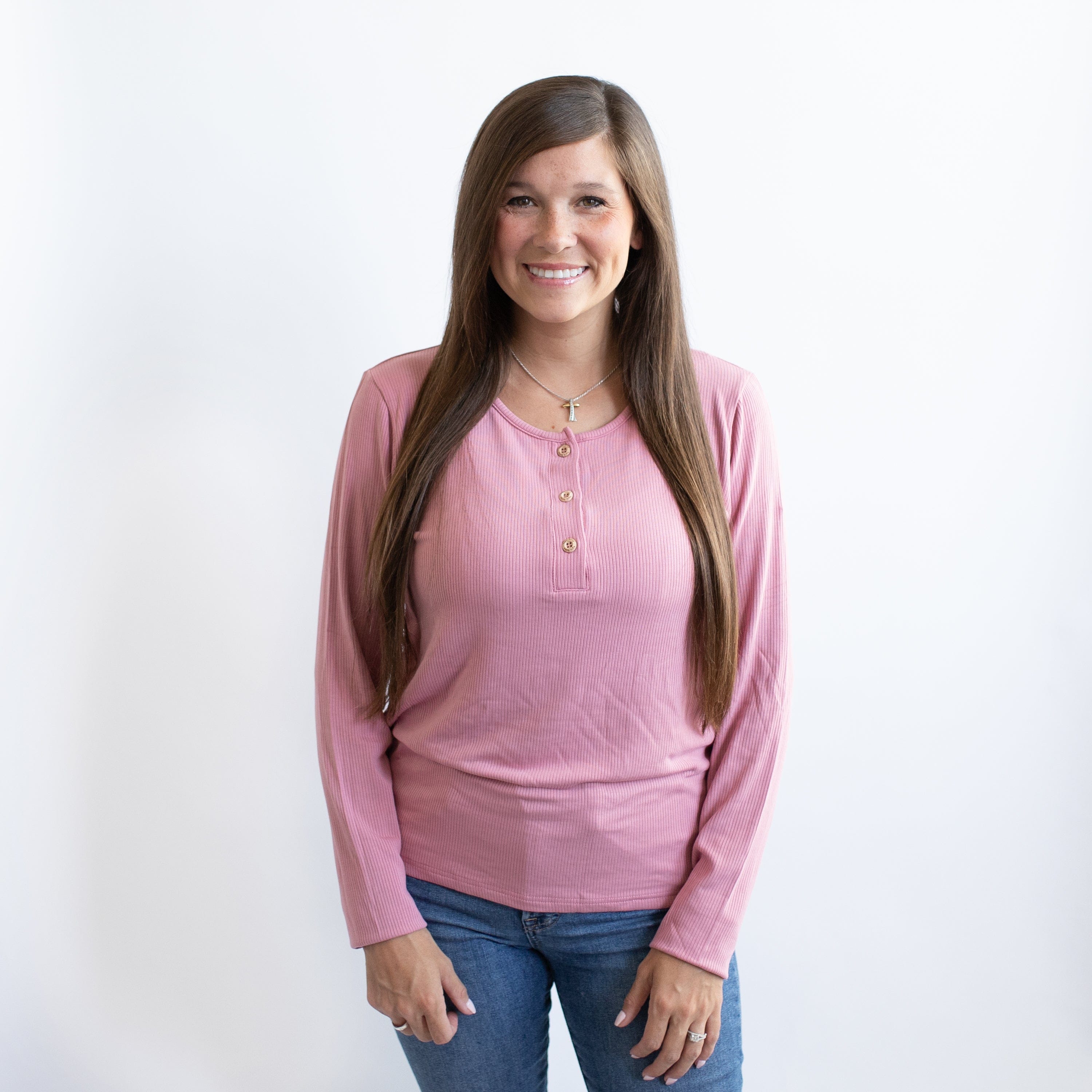 Woman wearing Kyte Baby Women's Ribbed Henley Top in Apple Blossom