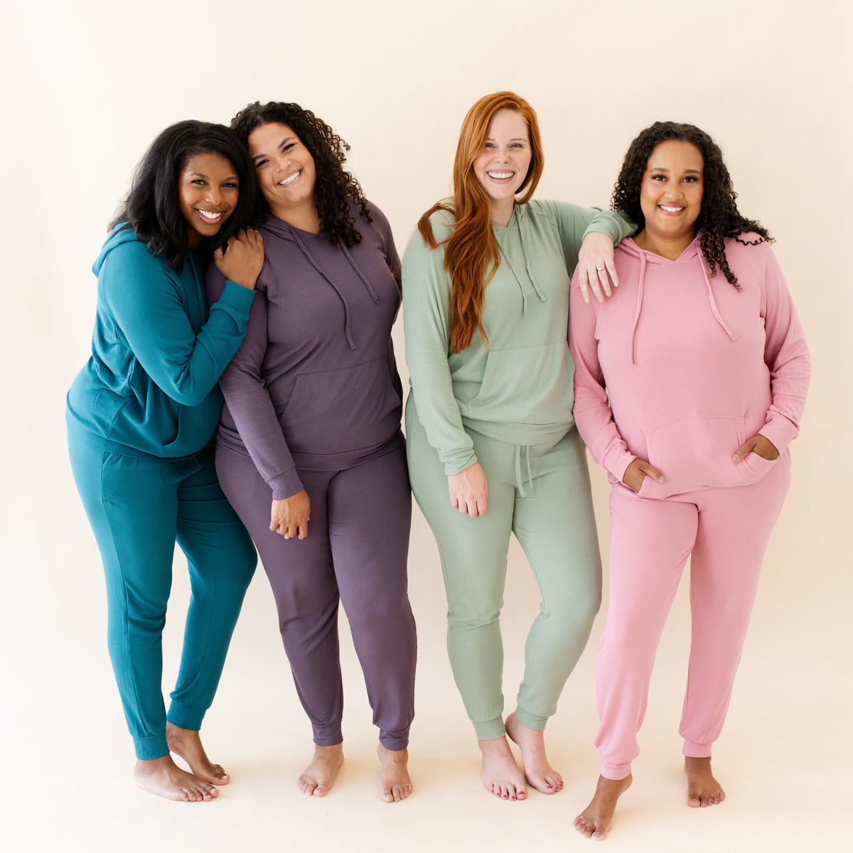 Models wearing Women's Ribbed Hoodie and Jogger Sets