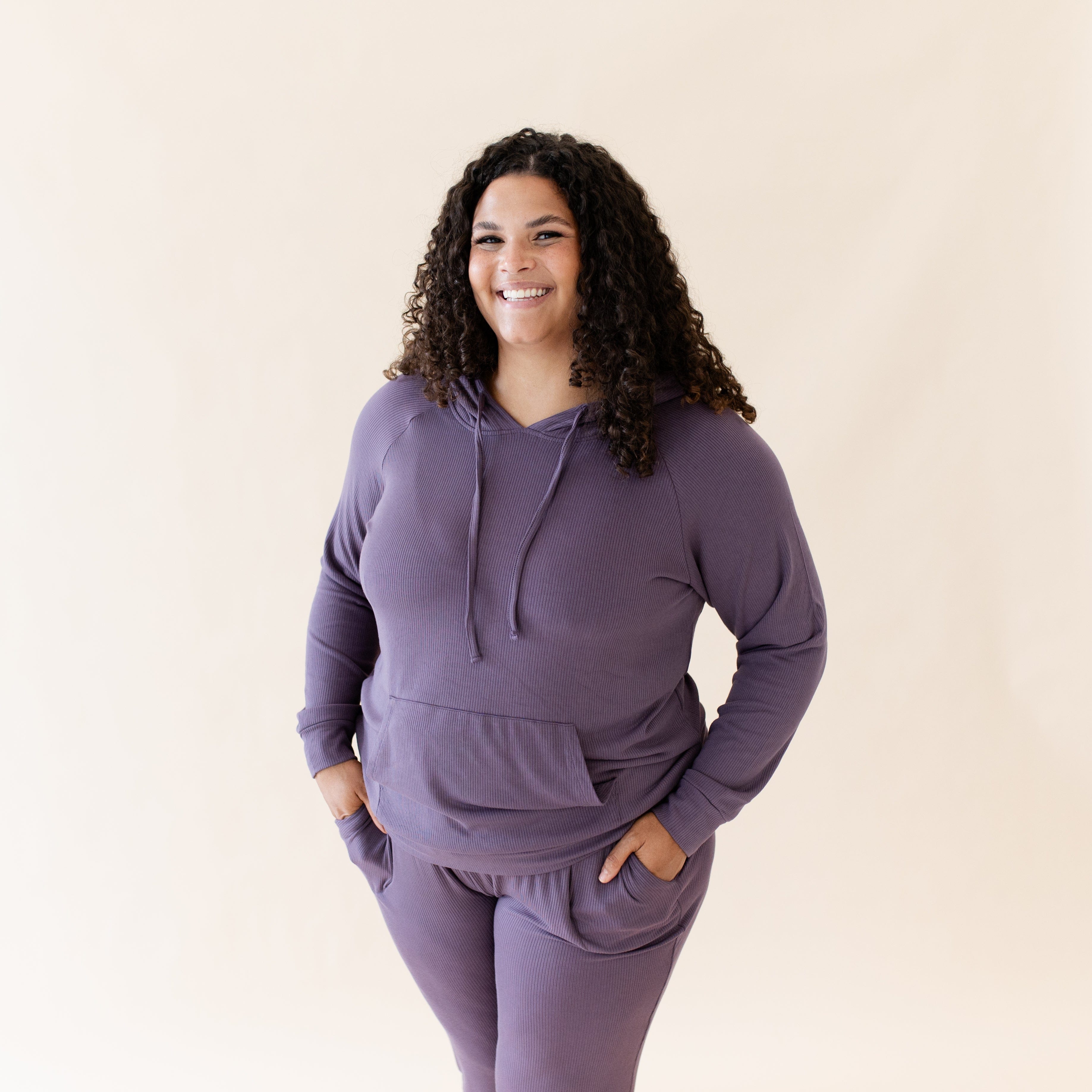 Model wearing Women's Ribbed Purple Hoodie with kangaroo pocket