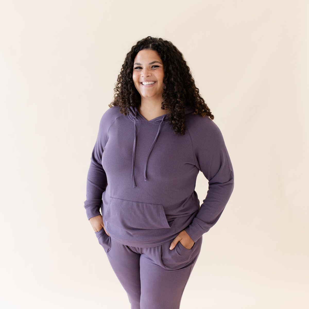 Model wearing Women's Ribbed Purple Hoodie with kangaroo pocket