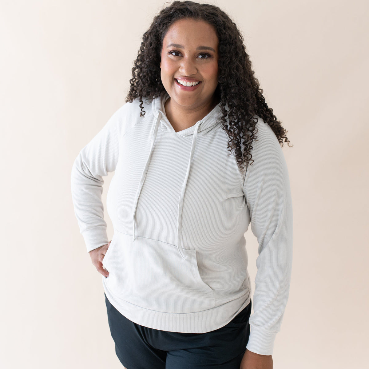 Woman wearing Women's bamboo Ribbed Hoodie in Oat