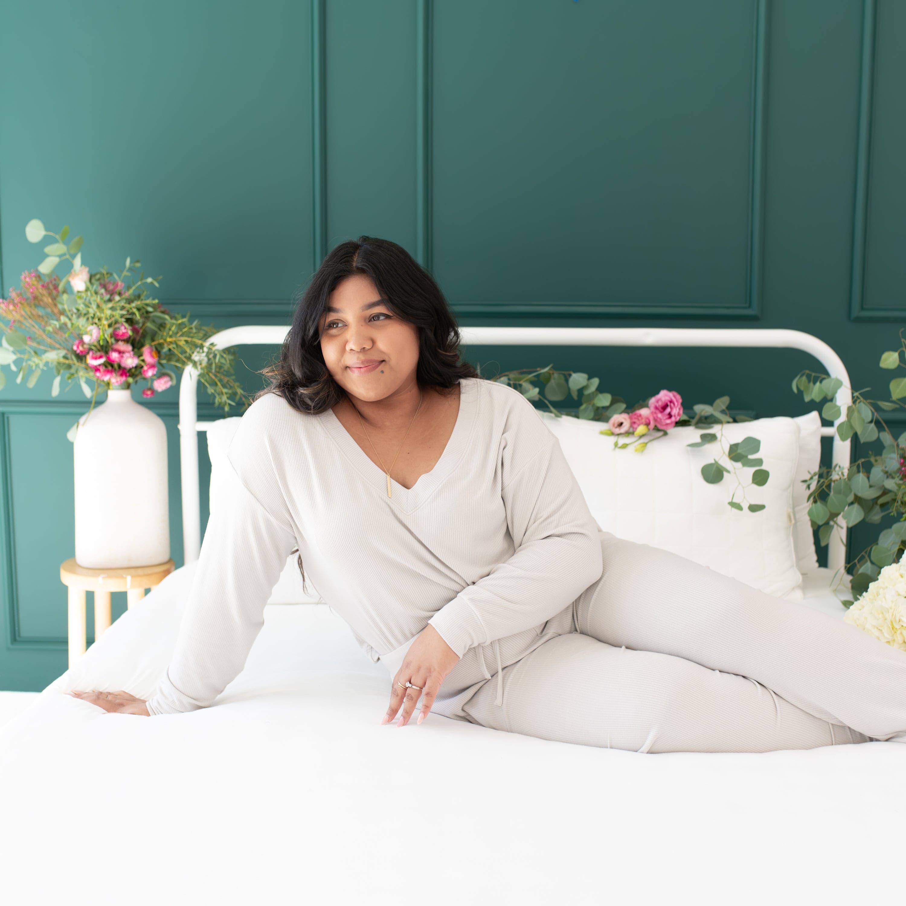 Woman wearing Kyte Baby Women's Ribbed Jogger Pant in Oat