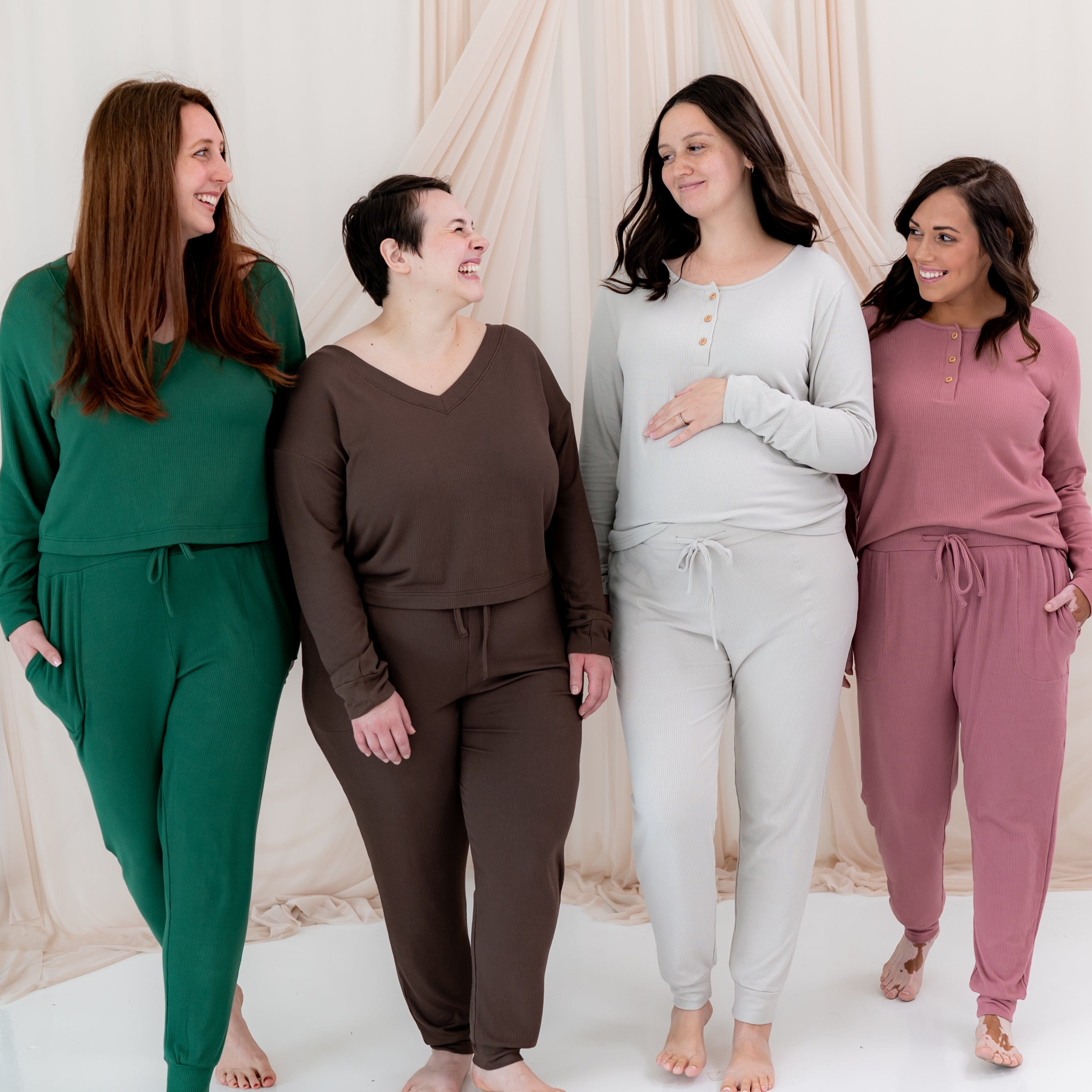 Women wearing Kyte Baby Ribbed Jogger Pants with matching tops