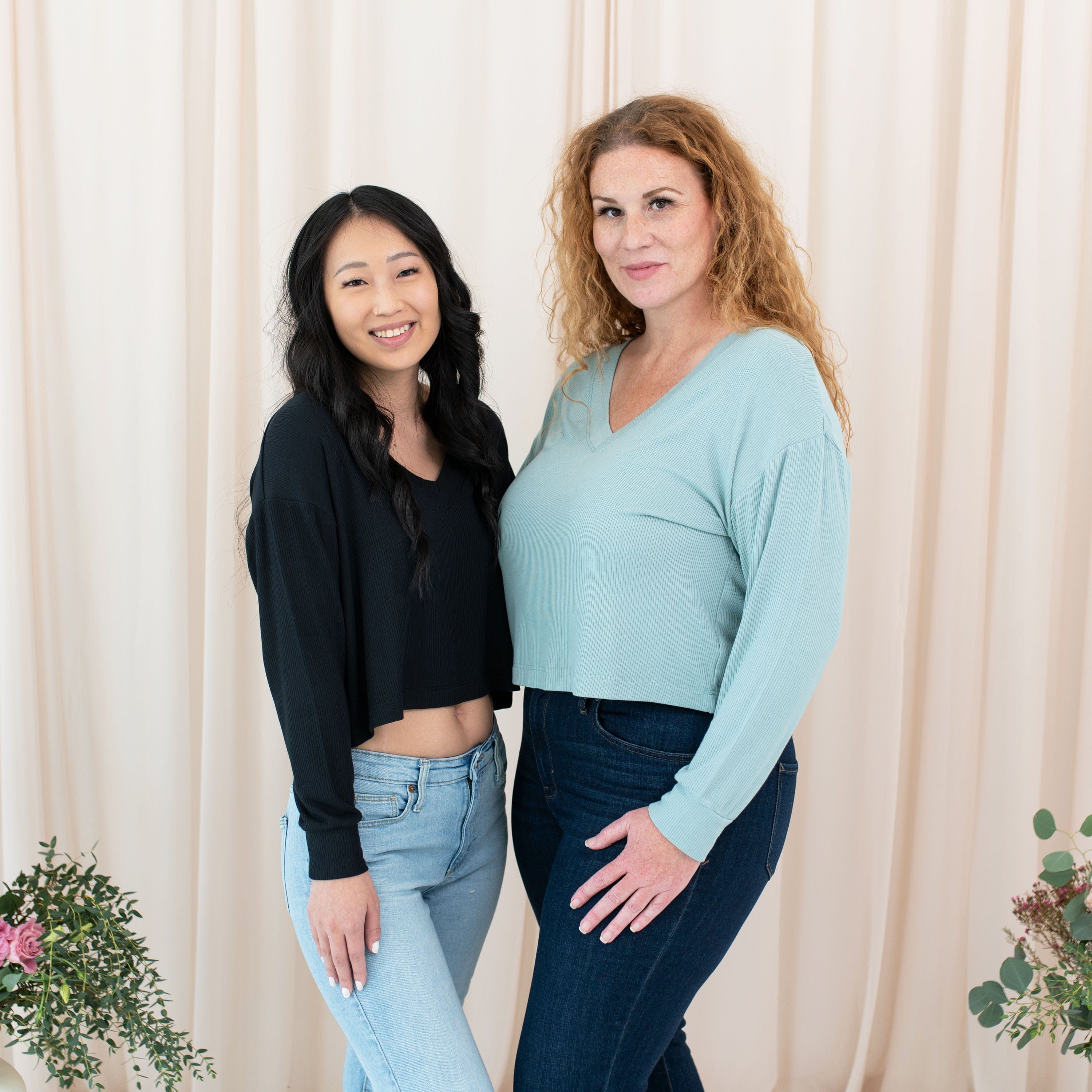 Women wearing Kyte Baby V-neck Ribbed Long Sleeve Crop Tops