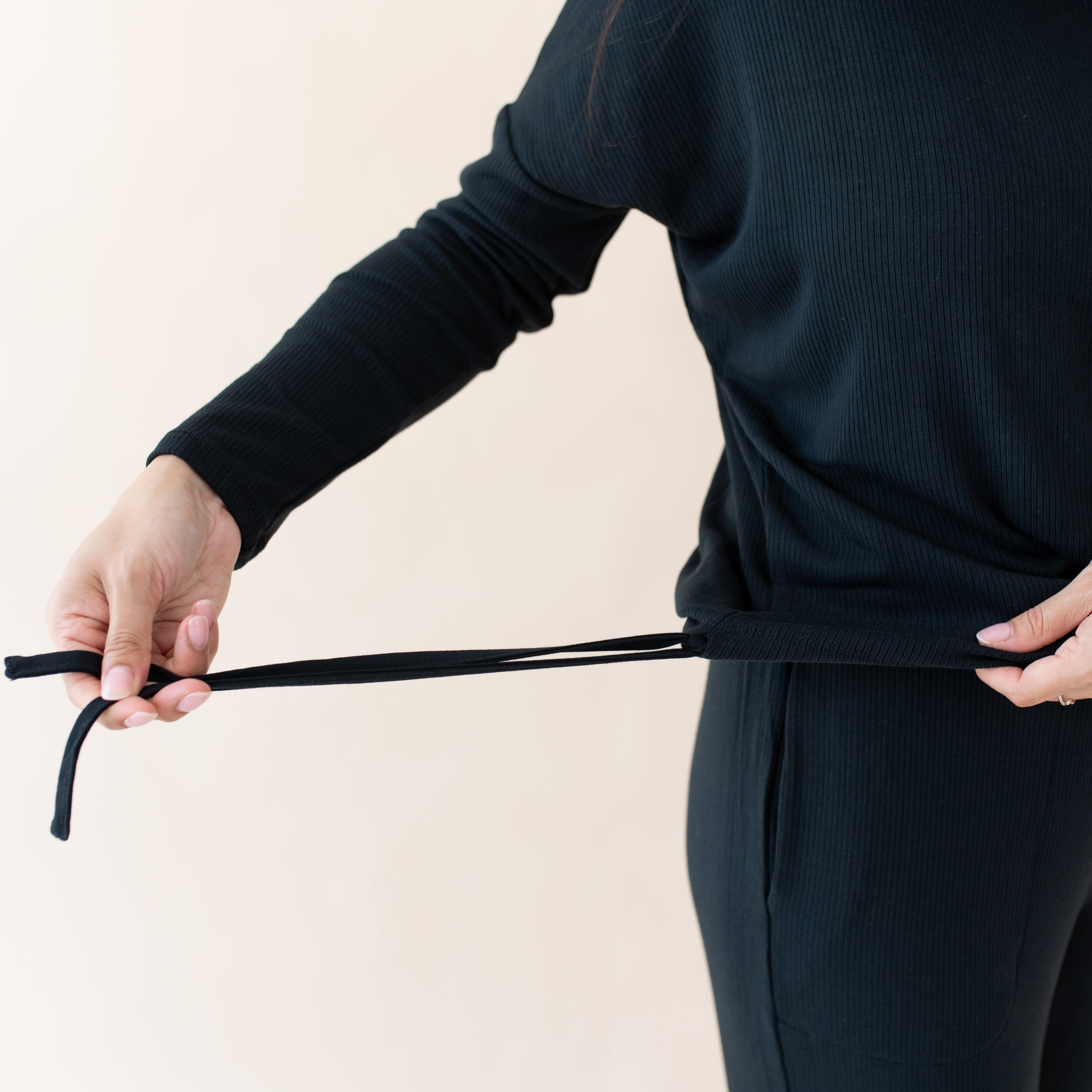 Drawstring Hem on Kyte Baby Women's Ribbed Long Sleeve Drop Shoulder Top in Midnight