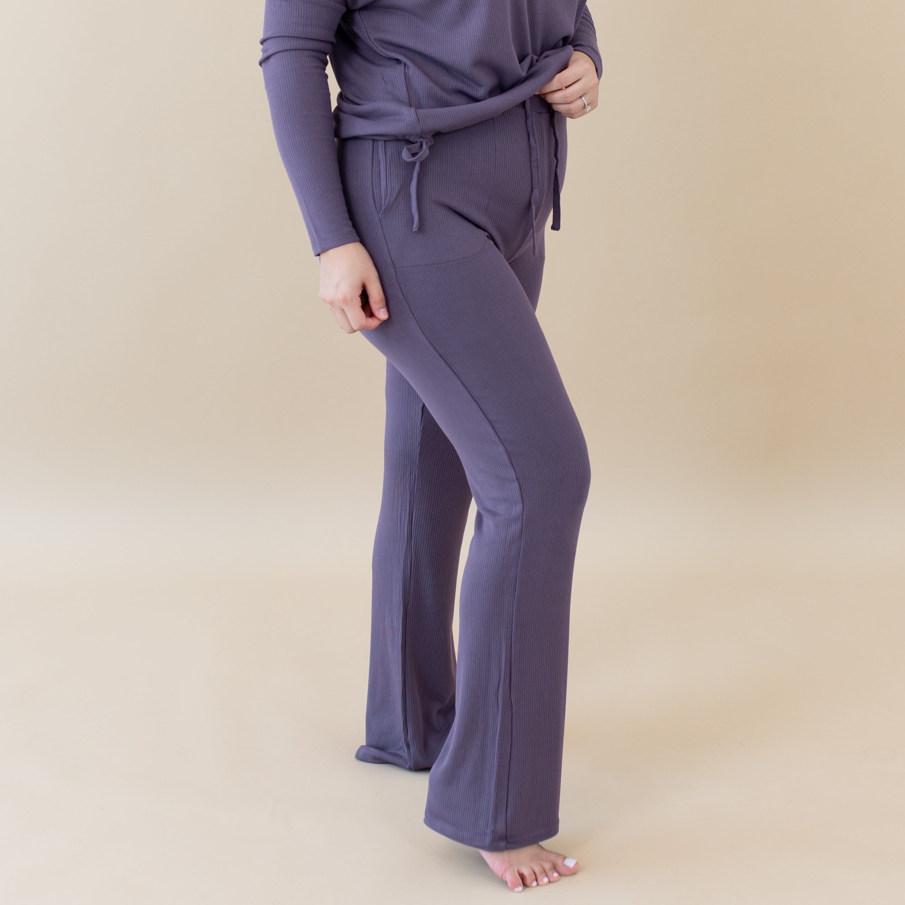 Model wearing purple Women's Ribbed High Waisted Wide Leg Pant in Currant