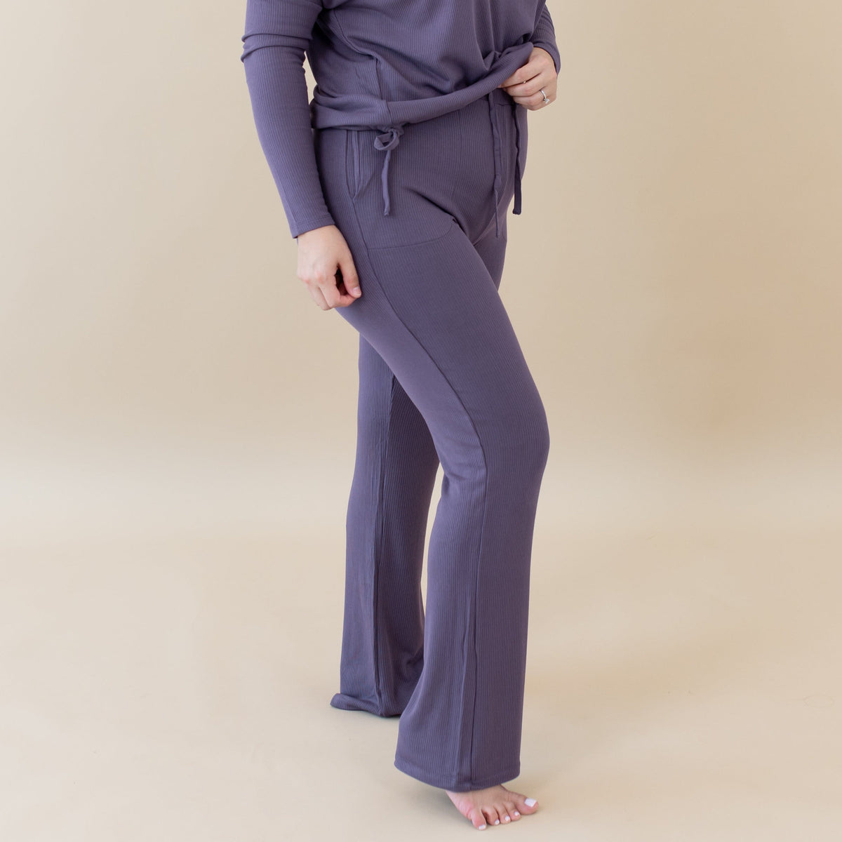 Model wearing purple Women's Ribbed High Waisted Wide Leg Pant in Currant