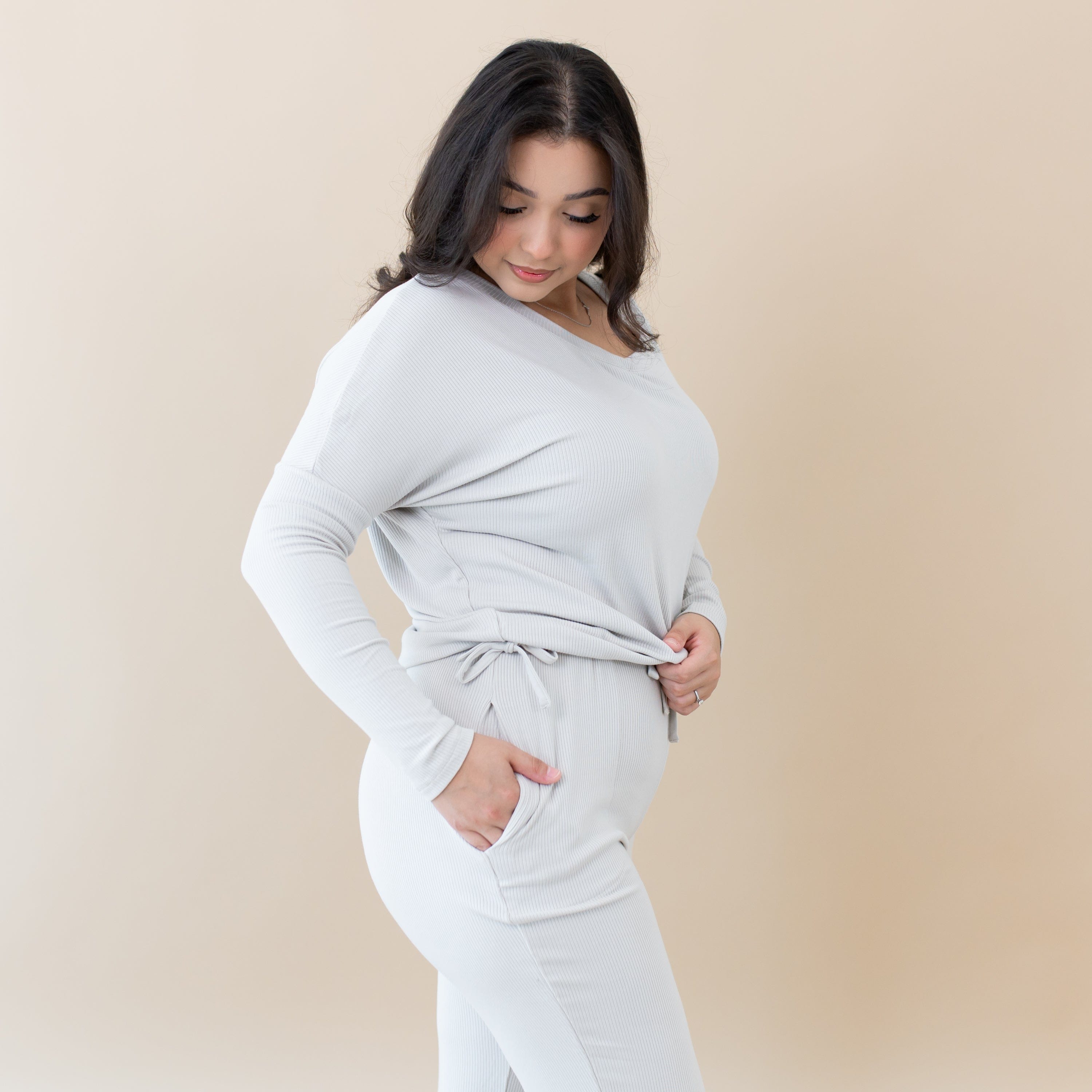 Model wearing Women's Ribbed High Waisted Wide Leg Pant in Oat with matching drop shoulder top