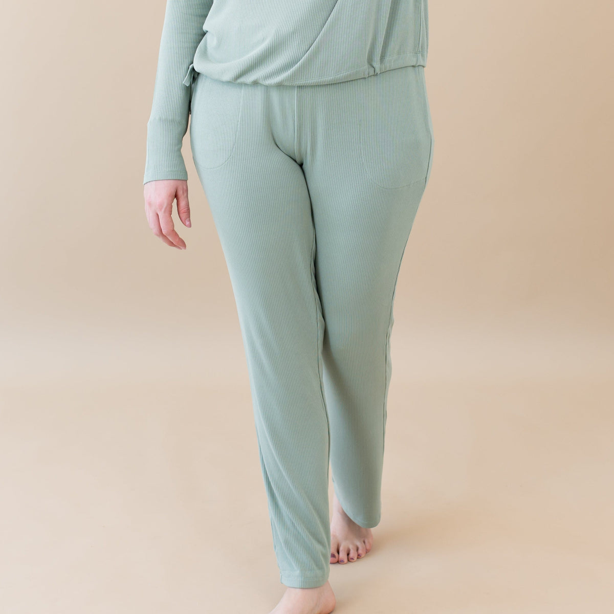 Model wearing Women's Ribbed High Waisted Green Wide Leg Pant