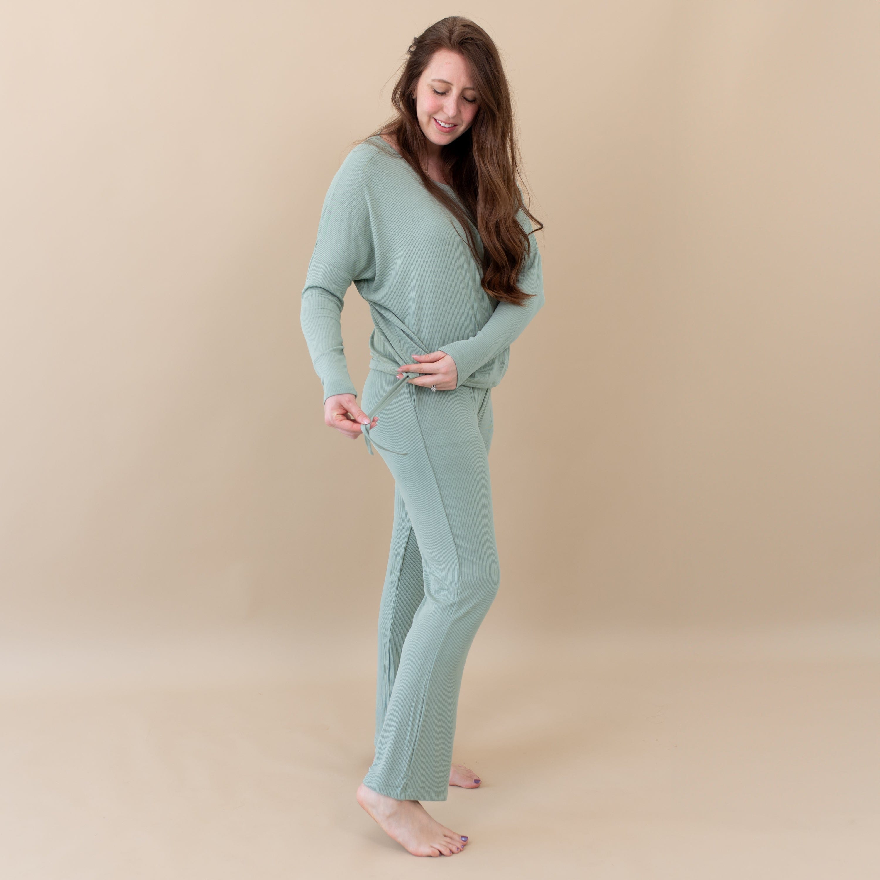 Model wearing Women's Ribbed High Waisted Wide Leg Pant and Drop Shoulder Top in Thyme green