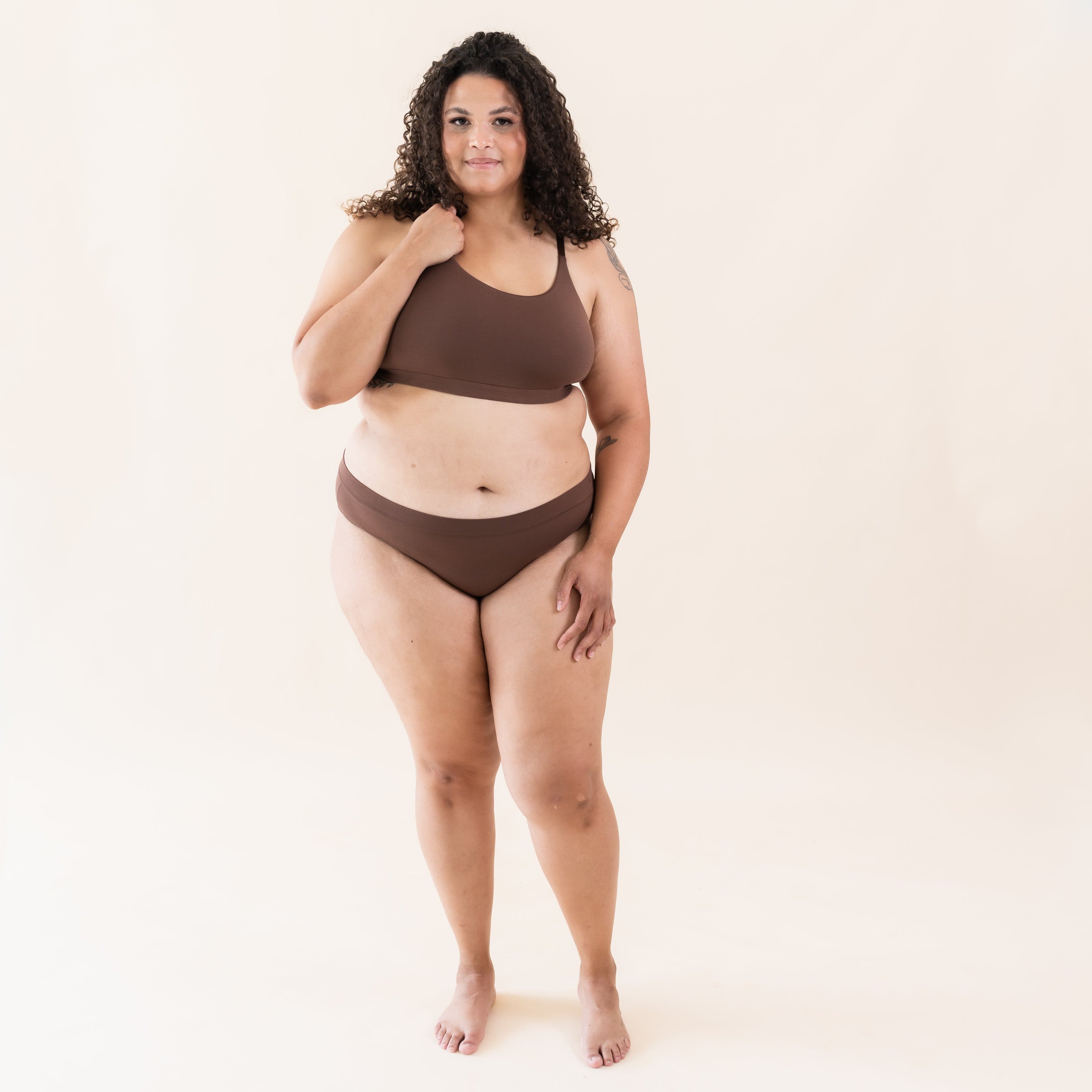 Woman wearing Kyte Baby Women's Scoop Neck Bralette in Toffee