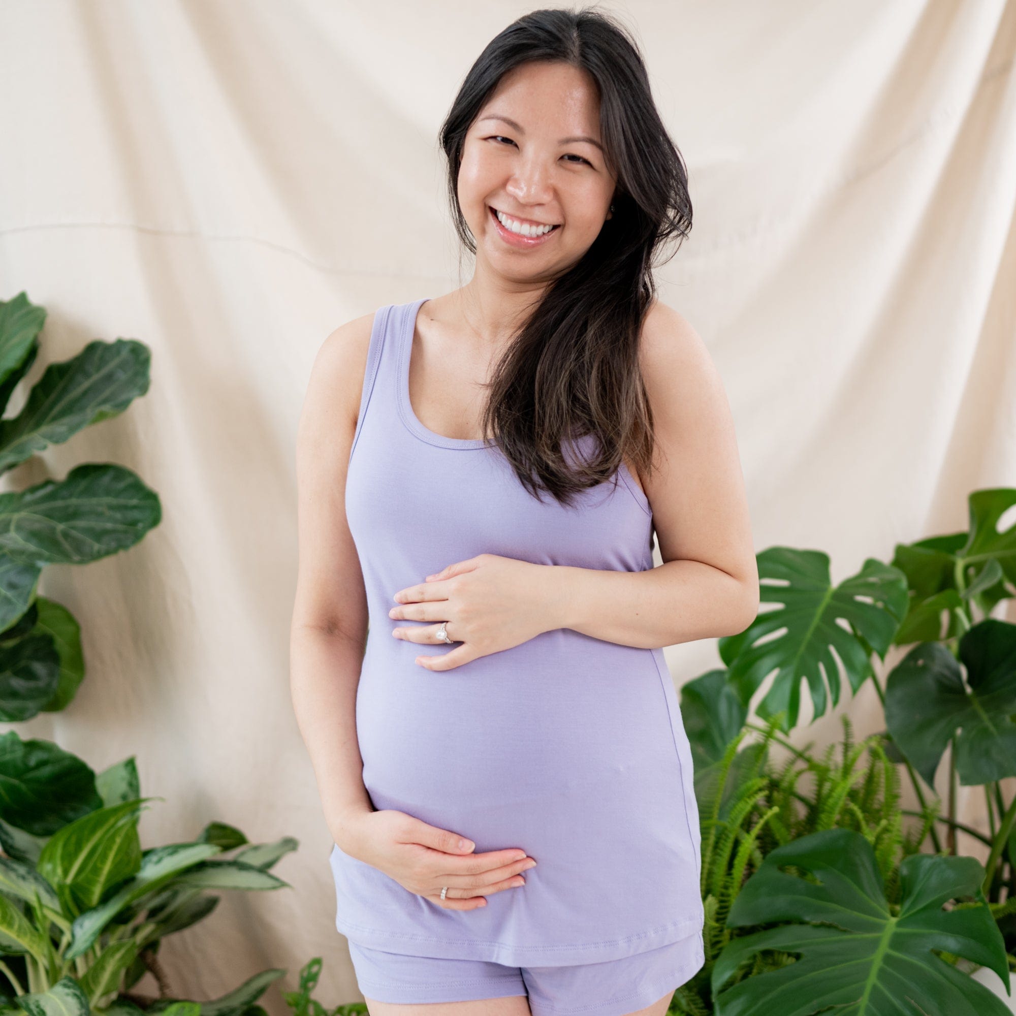 Pregnant woman wearing Kyte Baby Women's Tank Set in Taro