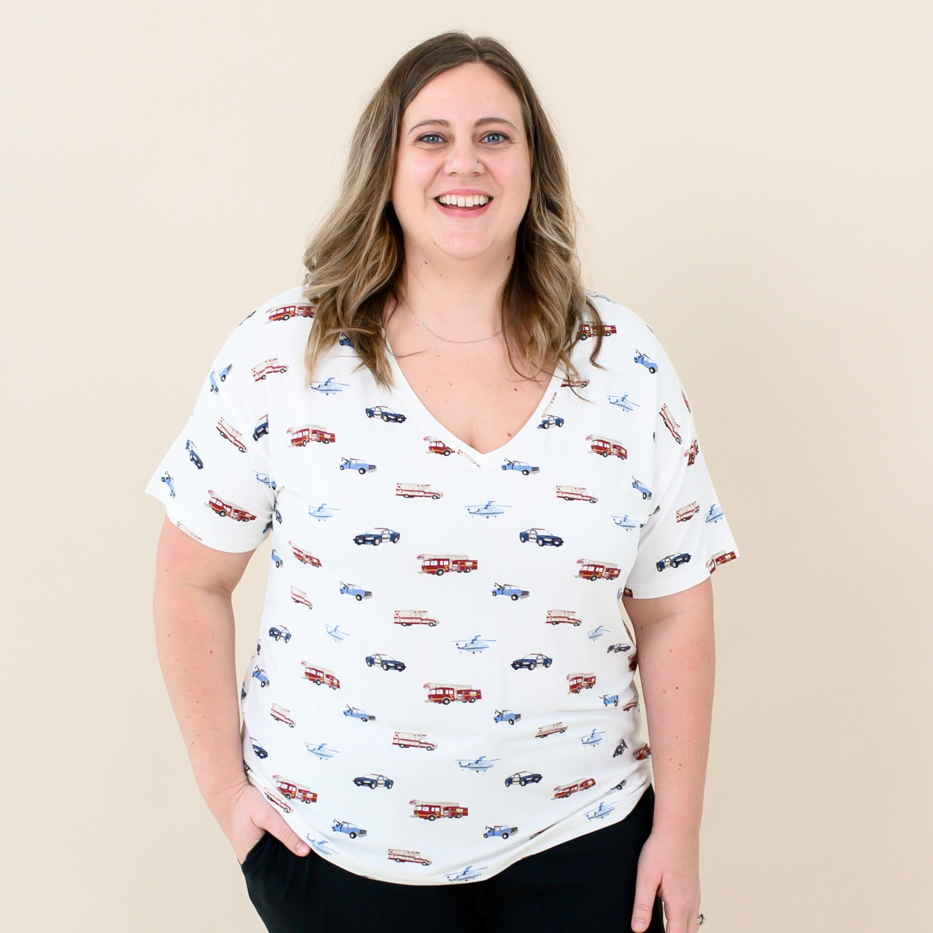 Woman wearing Kyte Baby Women's Relaxed Fit V-Neck in First Responder