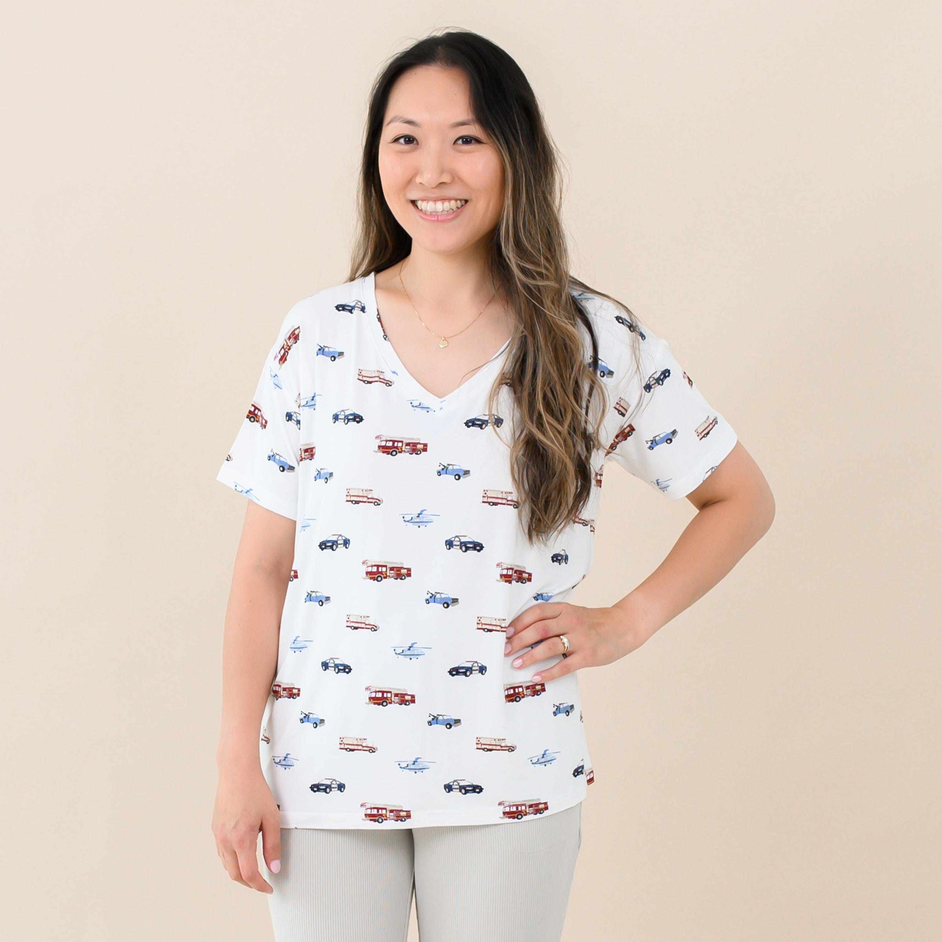 Woman wearing Kyte Baby Women's Relaxed Fit V-Neck tee in First Responder