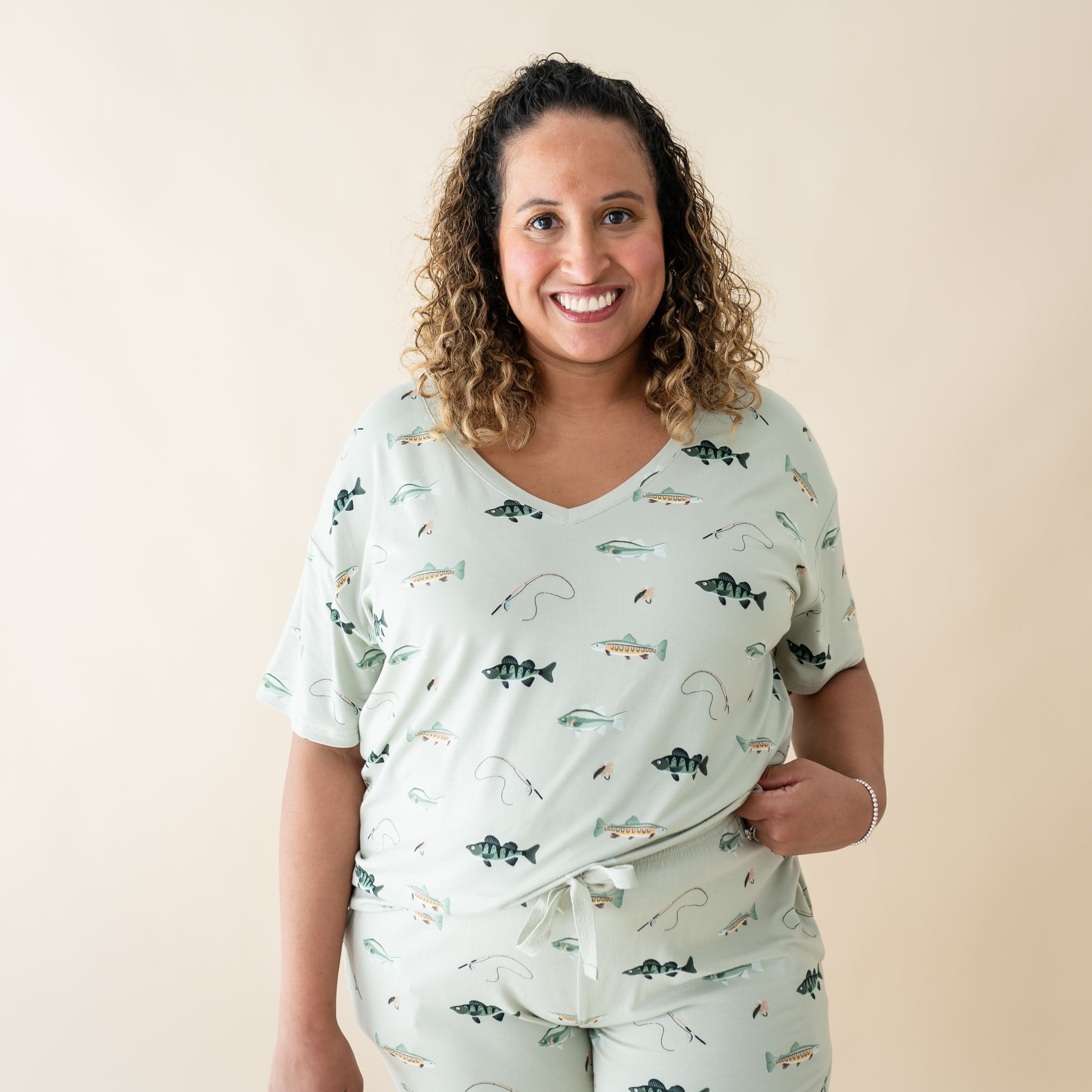 Woman wearing Kyte Baby Women's Relaxed Fit V-Neck in Fishing