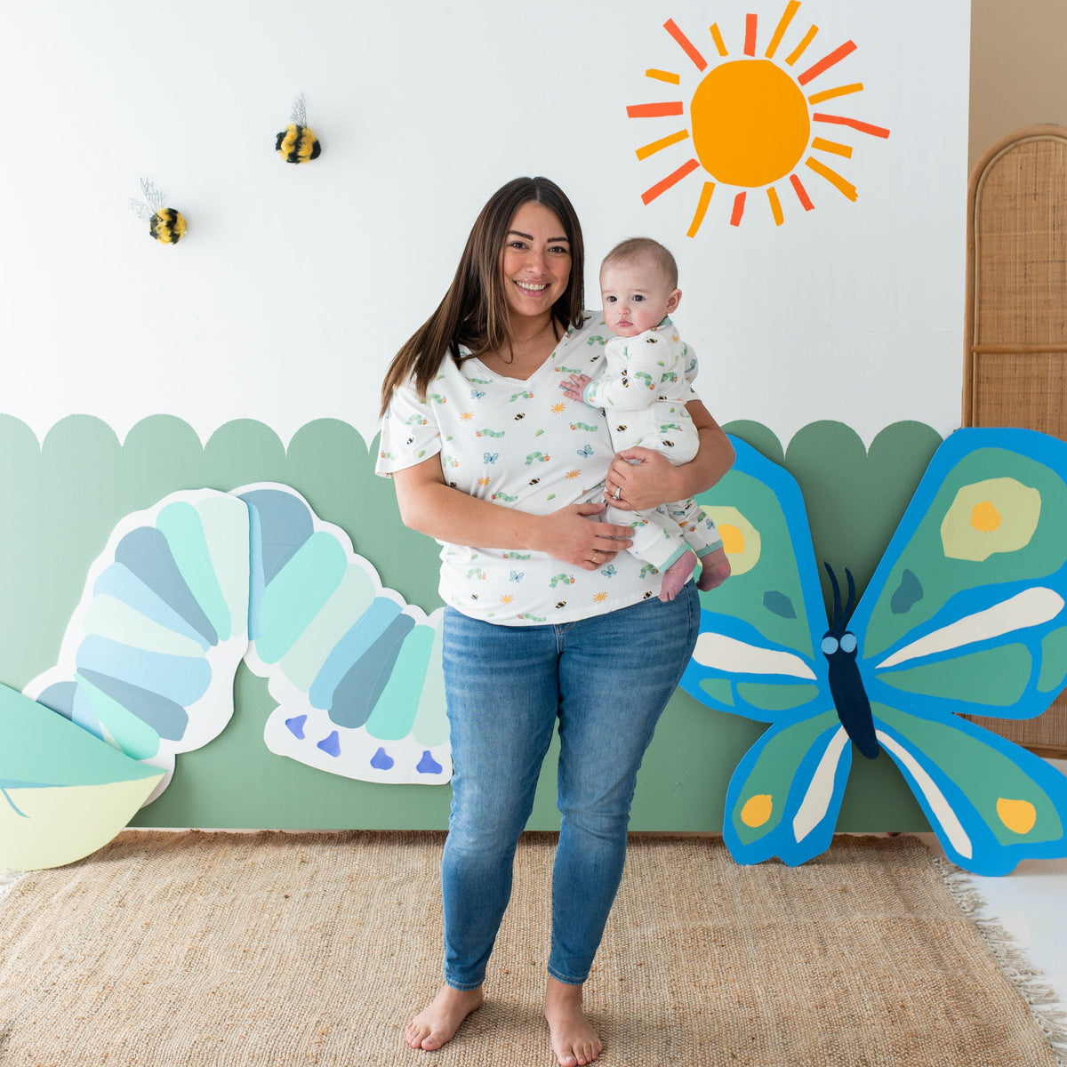 Woman wearing Kyte Baby Women's Relaxed Fit V-Neck in The Very Hungry Caterpillar™ and Friends