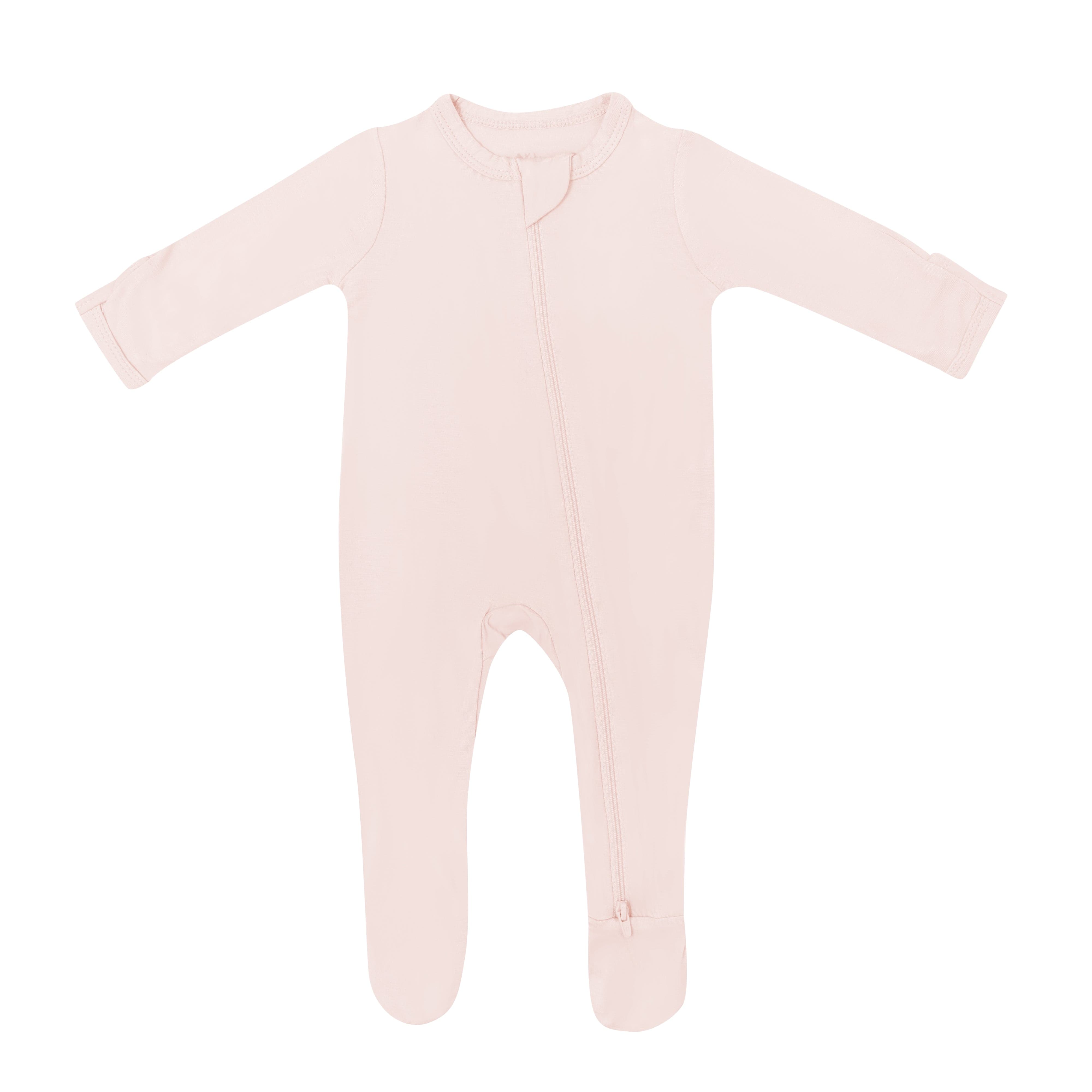 Flat lay of Kyte Baby Zippered Footie in Blush