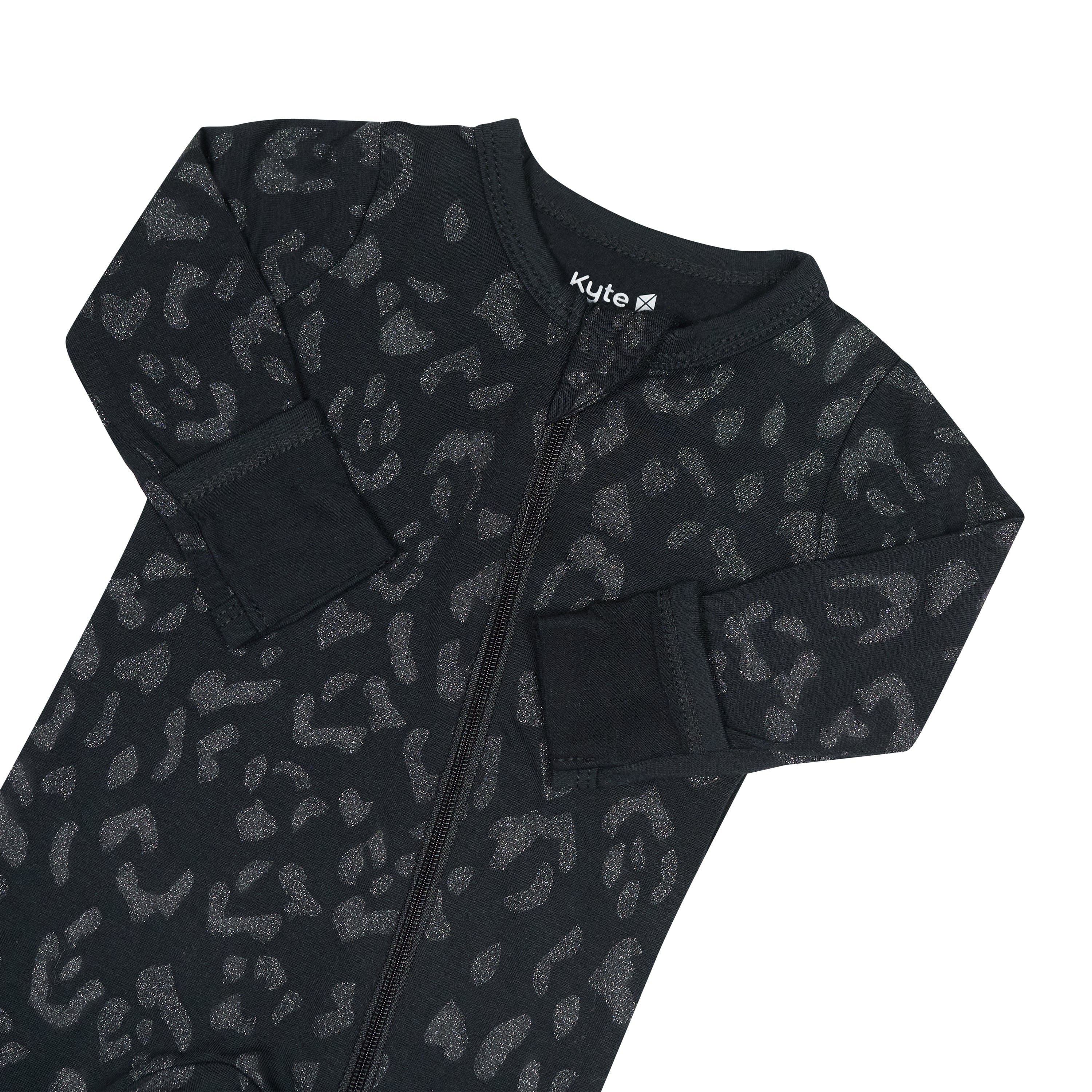 Zipper garage and fold over cuffs on the Zippered Footie in Midnight Leopard
