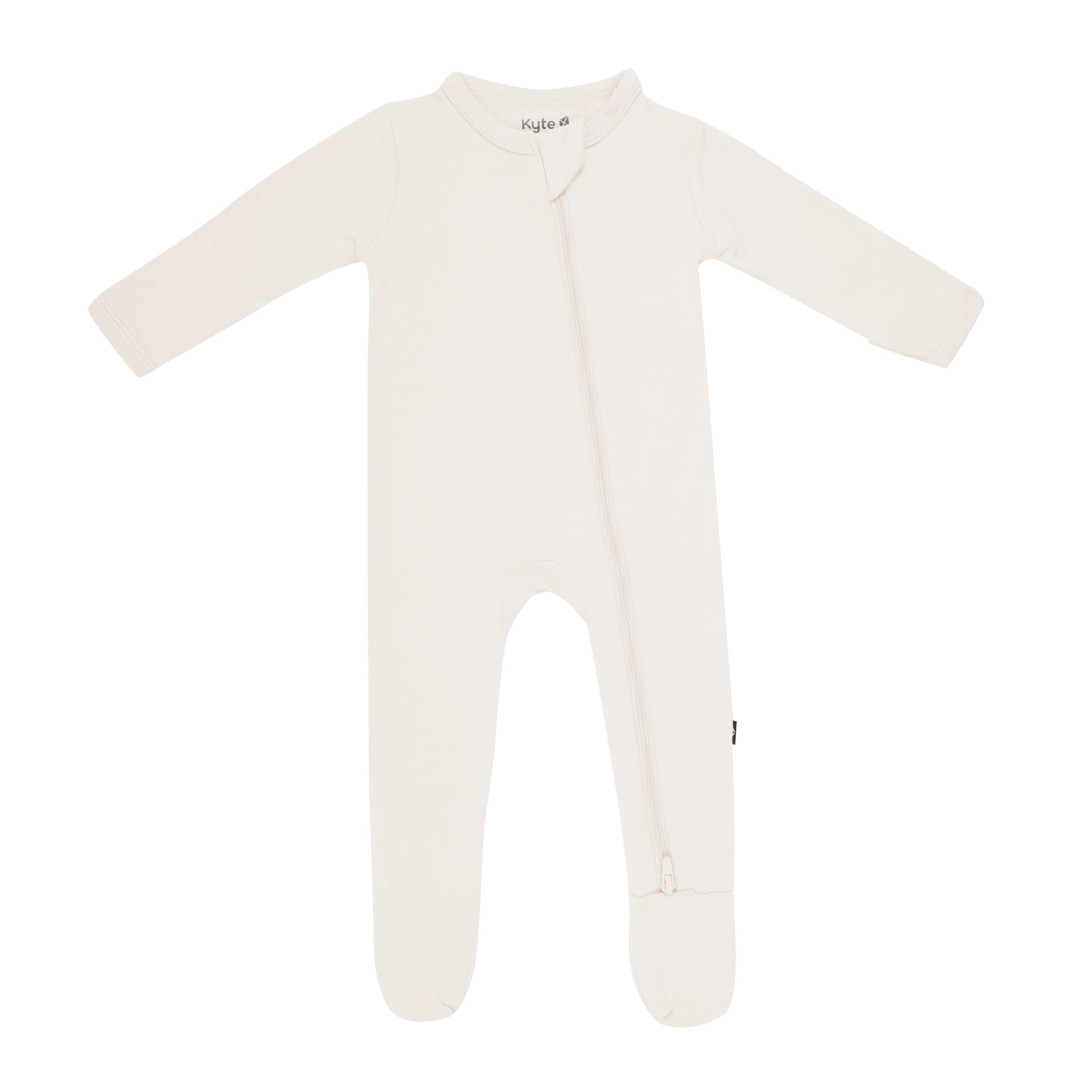 Flat lay of Kyte Baby Zippered Footie in Oat