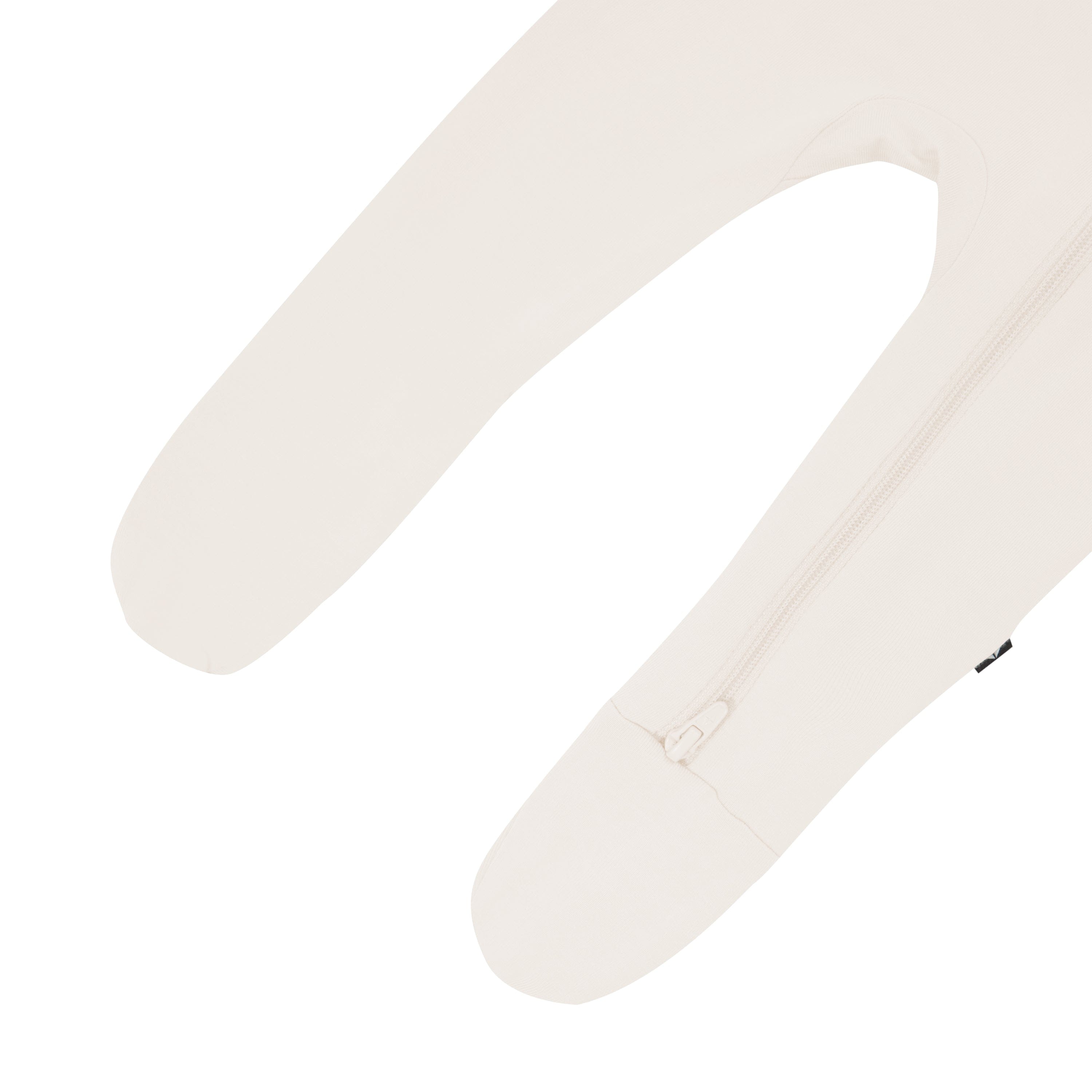 Closed feet on Kyte Baby Zippered Footie in Oat