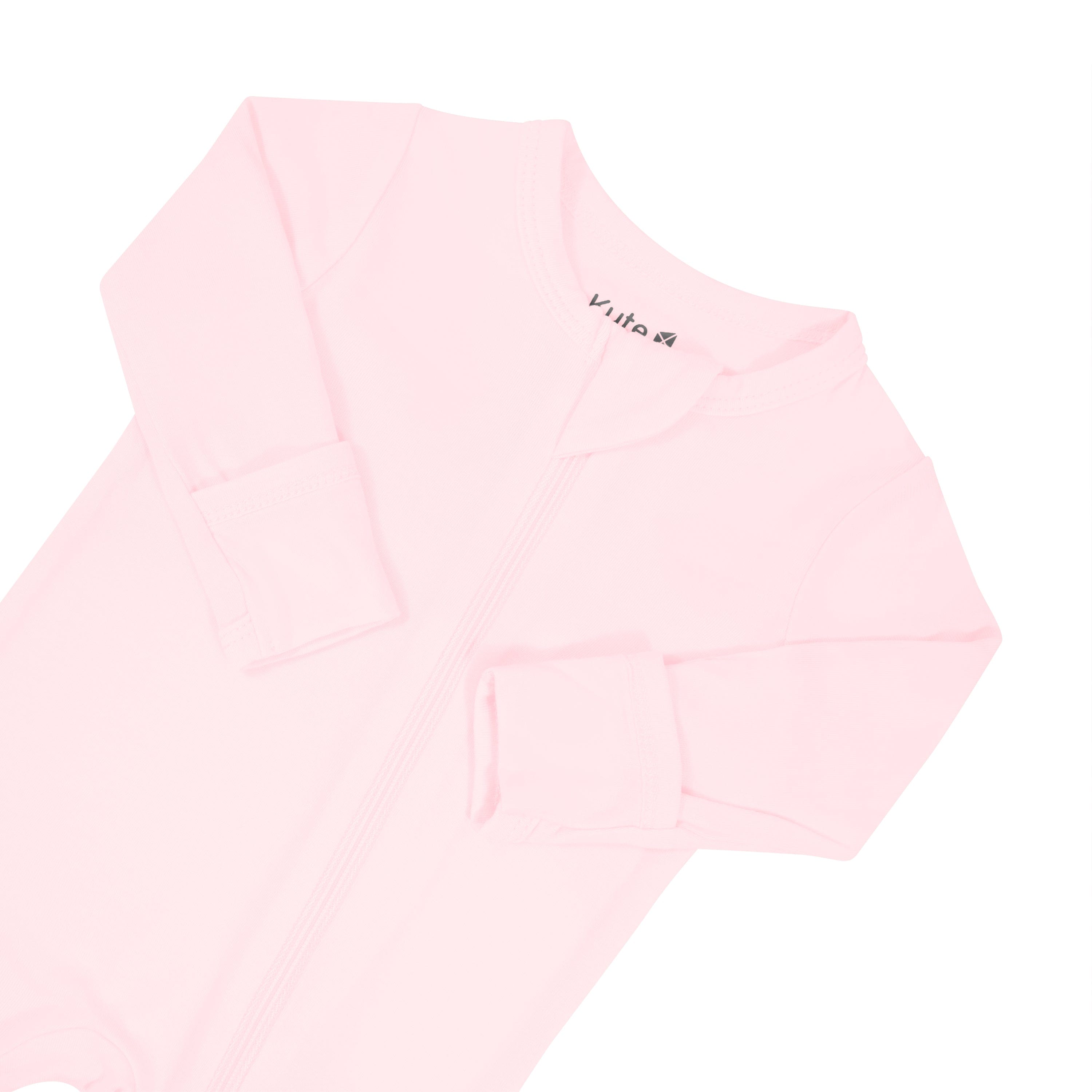 Zipper garage and fold over cuffs on Kyte Baby Zippered Footie in Sakura