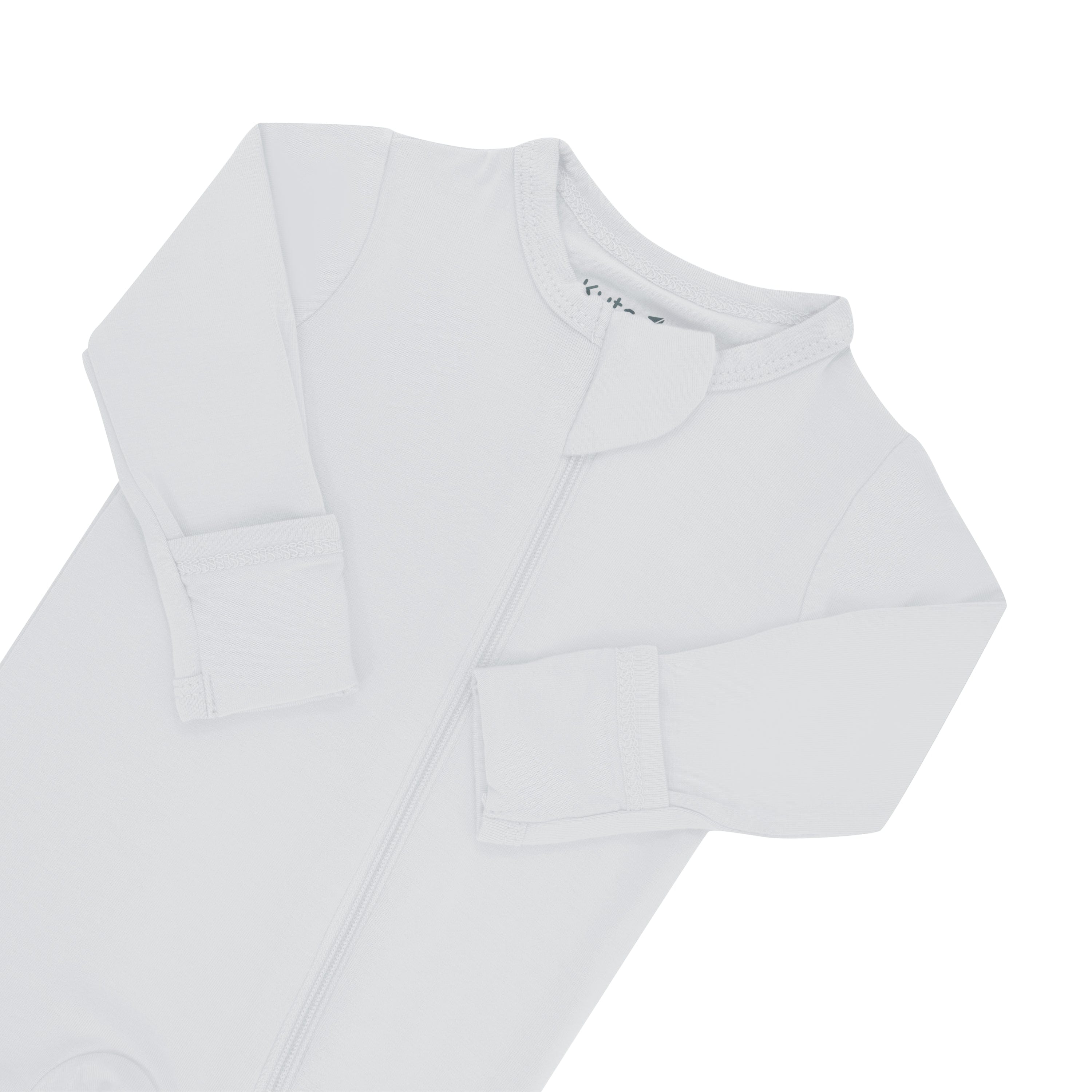 Zipper garage and fold over cuffs on Kyte Baby Zippered Footie in Storm