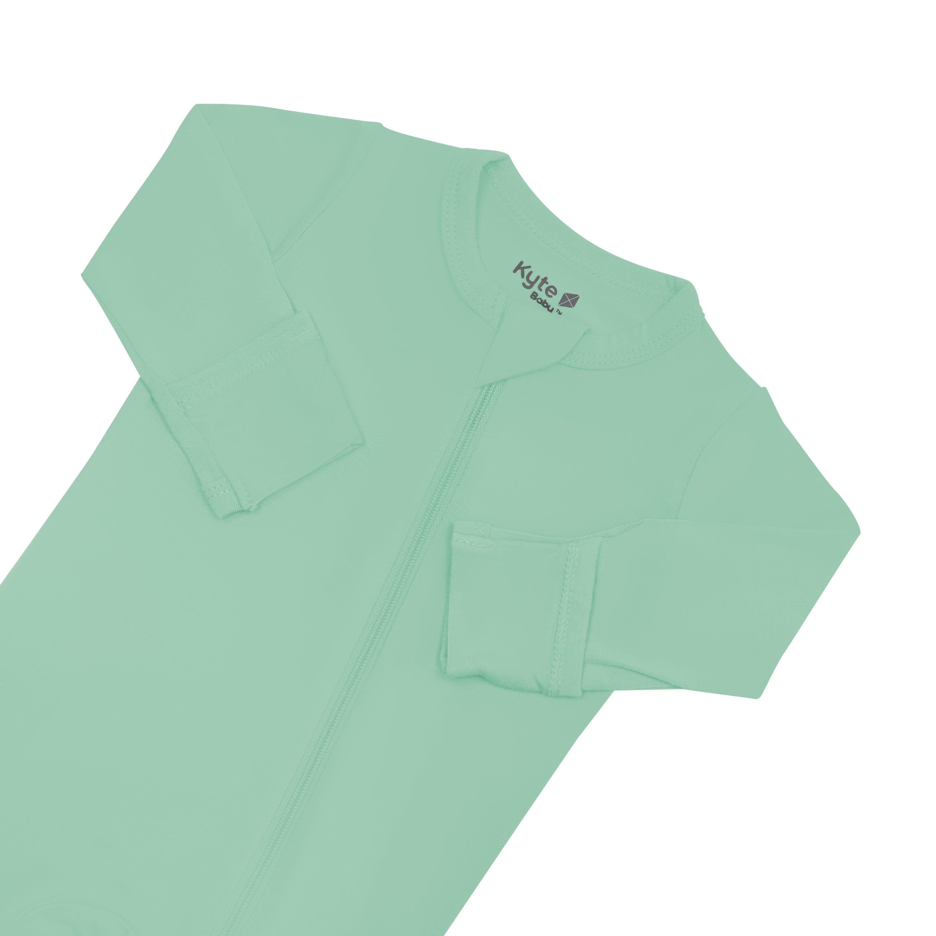 Zipper garage and fold over cuffs on Kyte Baby Zippered Footie in Wasabi