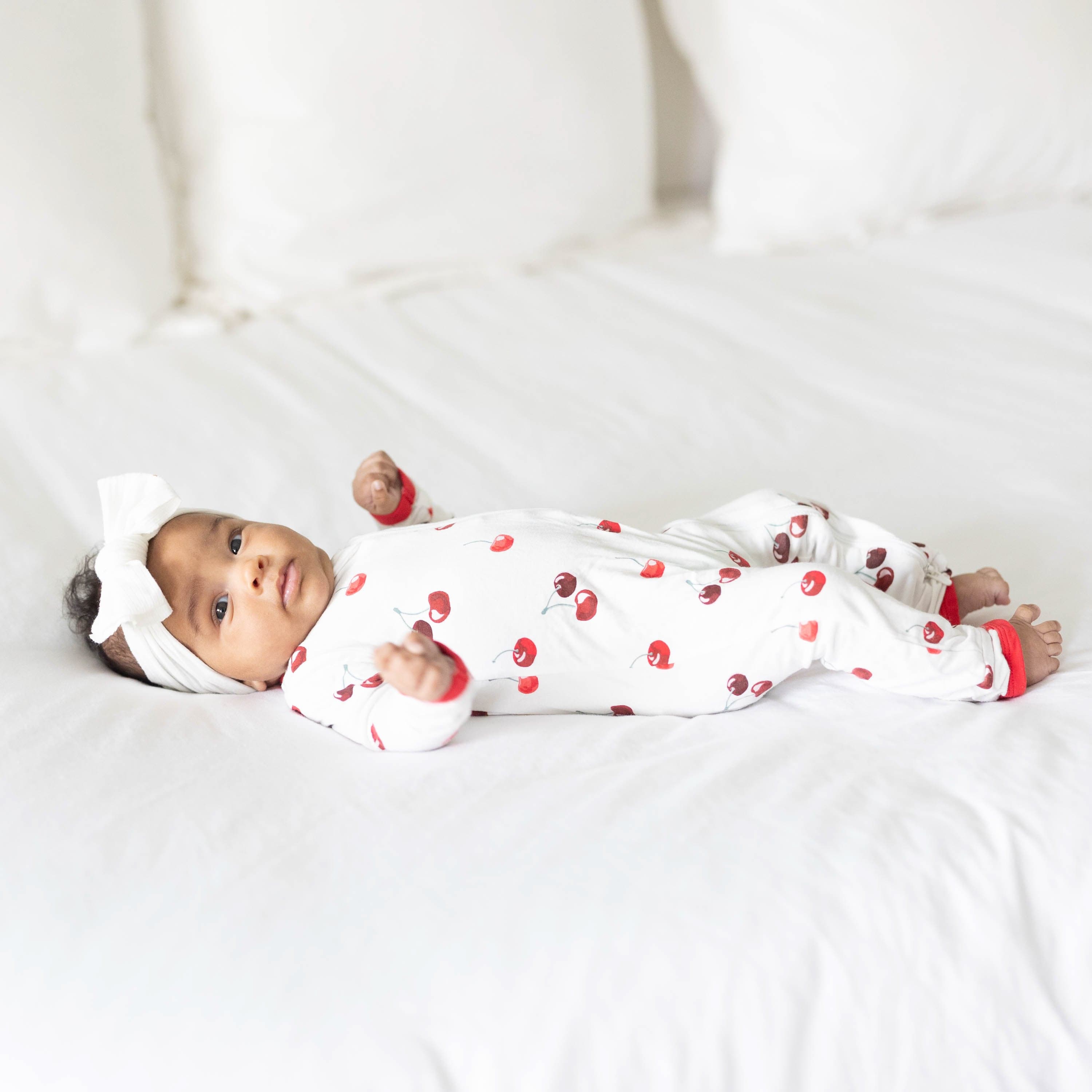 Kyte Baby Zippered Rompers Zippered Romper in Cherry